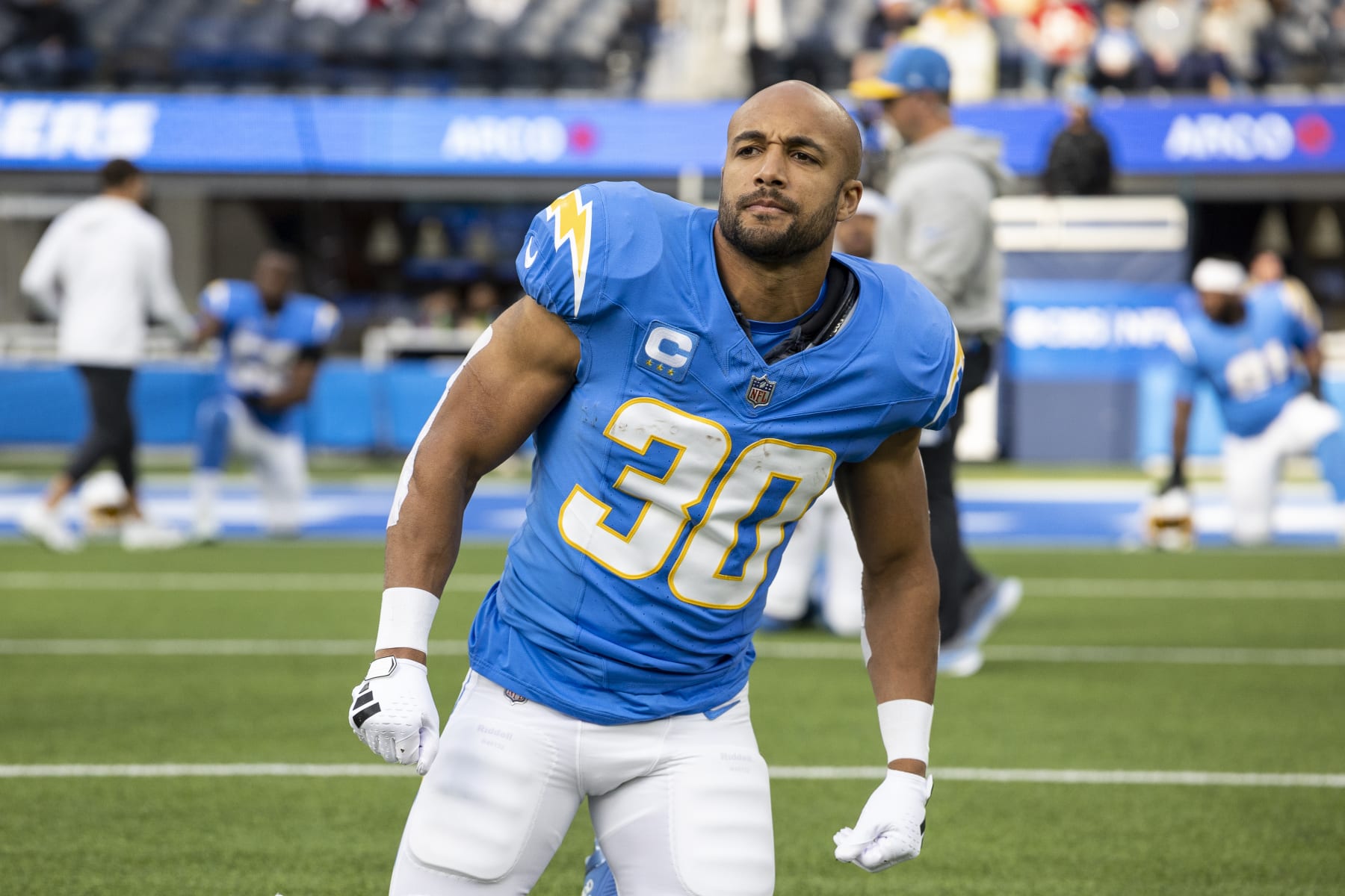 INGLEWOOD, CALIFORNIA - JANUARY 07: Austin Ekeler #30 of the Los Angeles Chargers stretches prior to an NFL football game between the Los Angeles Chargers and the Kansas City Chiefs at SoFi Stadium on January 07, 2024 in Inglewood, California. (Photo by Michael Owens/Getty Images)