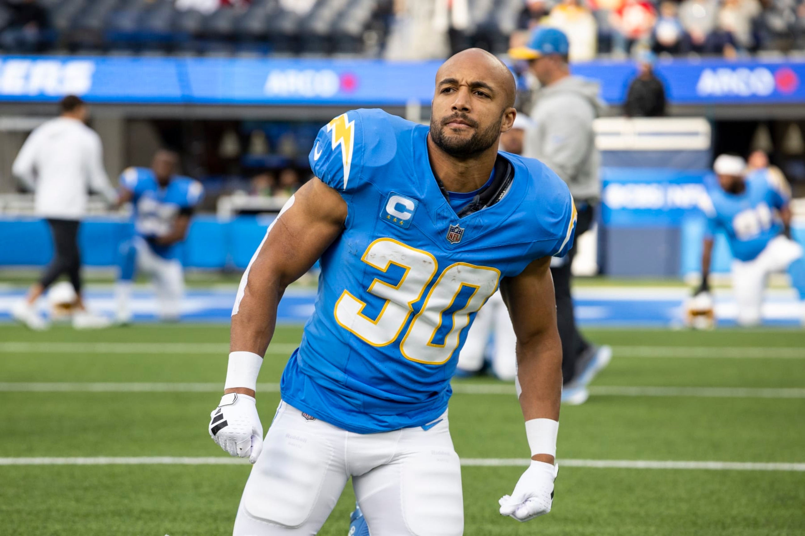 INGLEWOOD, CALIFORNIA - JANUARY 07: Austin Ekeler #30 of the Los Angeles Chargers stretches prior to an NFL football game between the Los Angeles Chargers and the Kansas City Chiefs at SoFi Stadium on January 07, 2024 in Inglewood, California. (Photo by Michael Owens/Getty Images)