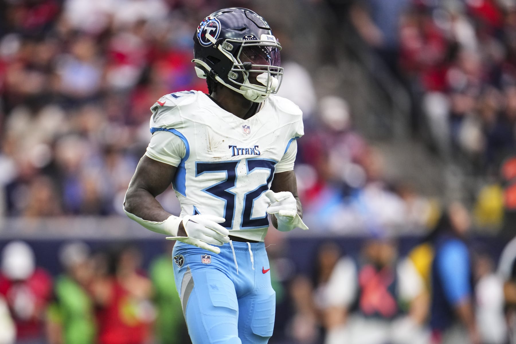 HOUSTON, TX - DECEMBER 31: Tyjae Spears #32 of the Tennessee Titans looks on from the field during an NFL football game against the Houston Texans at NRG Stadium on December 31, 2023 in Houston, Texas. (Photo by Cooper Neill/Getty Images)