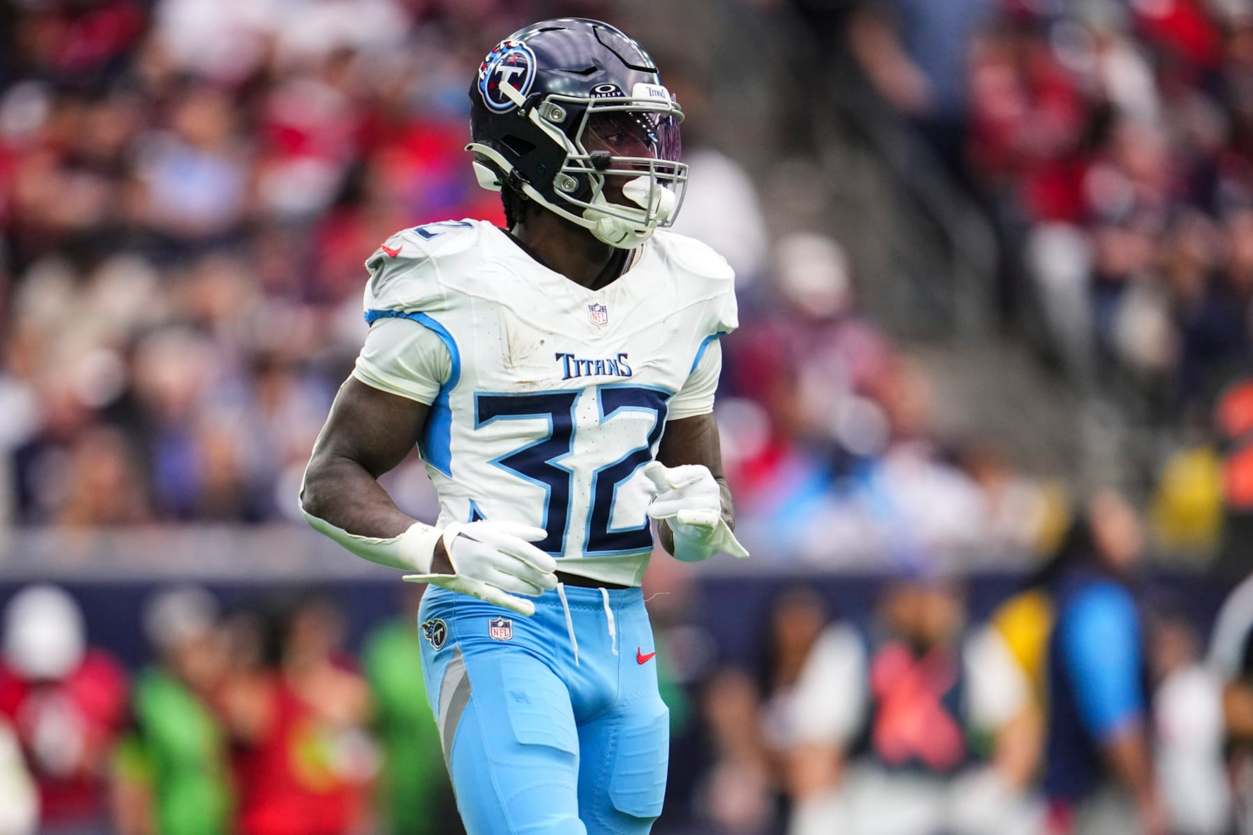HOUSTON, TX - DECEMBER 31: Tyjae Spears #32 of the Tennessee Titans looks on from the field during an NFL football game against the Houston Texans at NRG Stadium on December 31, 2023 in Houston, Texas. (Photo by Cooper Neill/Getty Images)