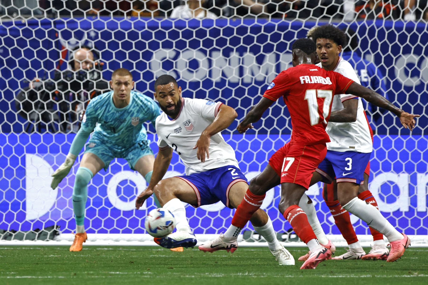 USA's defender #02 Cameron Carter-Vickers fights for the ball with Panama's forward #17 Jose Fajardo during the Conmebol 2024 Copa America tournament group C football match between Panama and USA at Mercedes Benz Stadium in Atlanta, Georgia, on June 27, 2024. (Photo by EDUARDO MUNOZ / AFP) (Photo by EDUARDO MUNOZ/AFP via Getty Images)