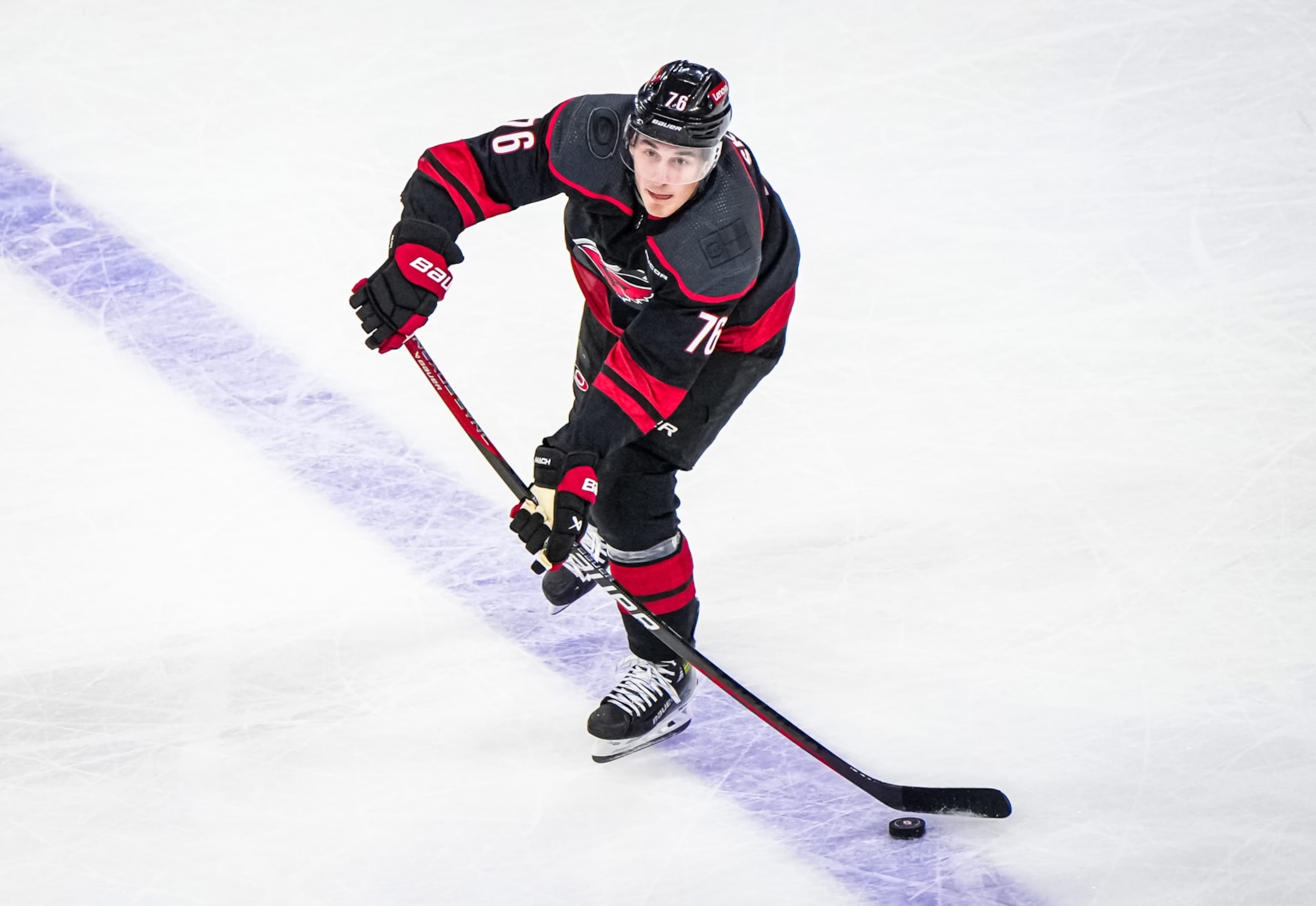 RALEIGH, NORTH CAROLINA - APRIL 20: Brady Skjei #76 of the Carolina Hurricanes passes the puck during the first period against the New York Islanders in Game One of the First Round of the 2024 Stanley Cup Playoffs at PNC Arena on April 7, 2024 in Raleigh, North Carolina. (Photo by Cato Cataldo/NHLI via Getty Images) RALEIGH, NORTH CAROLINA - APRIL 20: Brady Skjei #76 of the Carolina Hurricanes passes the puck during the first period against the New York Islanders in Game One of the First Round of the 2024 Stanley Cup Playoffs at PNC Arena on April 7, 2024 in Raleigh, North Carolina. (Photo by Cato Cataldo/NHLI via Getty Images)