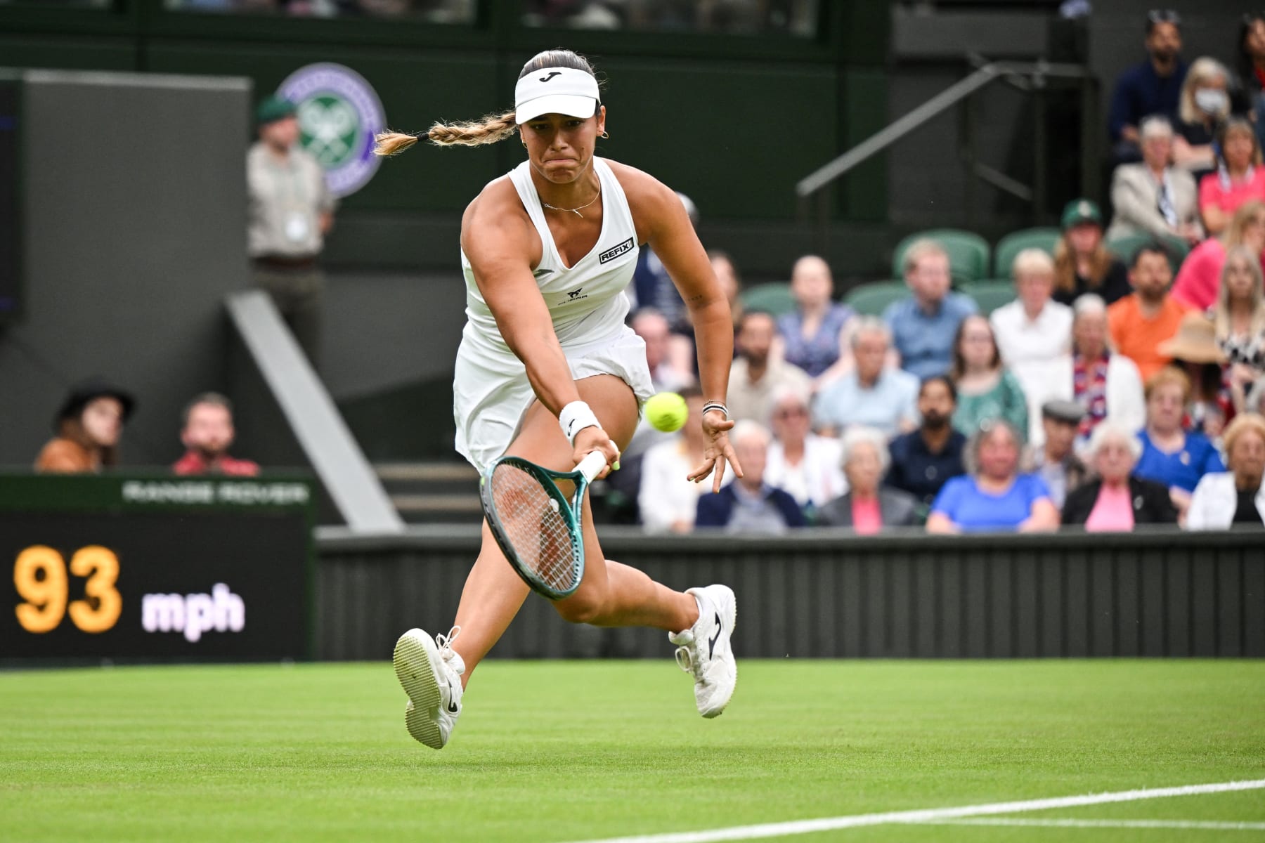 Spain's Jessica Bouzas Maneiro returns the ball to Czech Republic's Marketa Vondrousova during their women's singles tennis match on the second day of the 2024 Wimbledon Championships at The All England Lawn Tennis and Croquet Club in Wimbledon, southwest London, on July 2, 2024. (Photo by ANDREJ ISAKOVIC / AFP) / RESTRICTED TO EDITORIAL USE (Photo by ANDREJ ISAKOVIC/AFP via Getty Images)