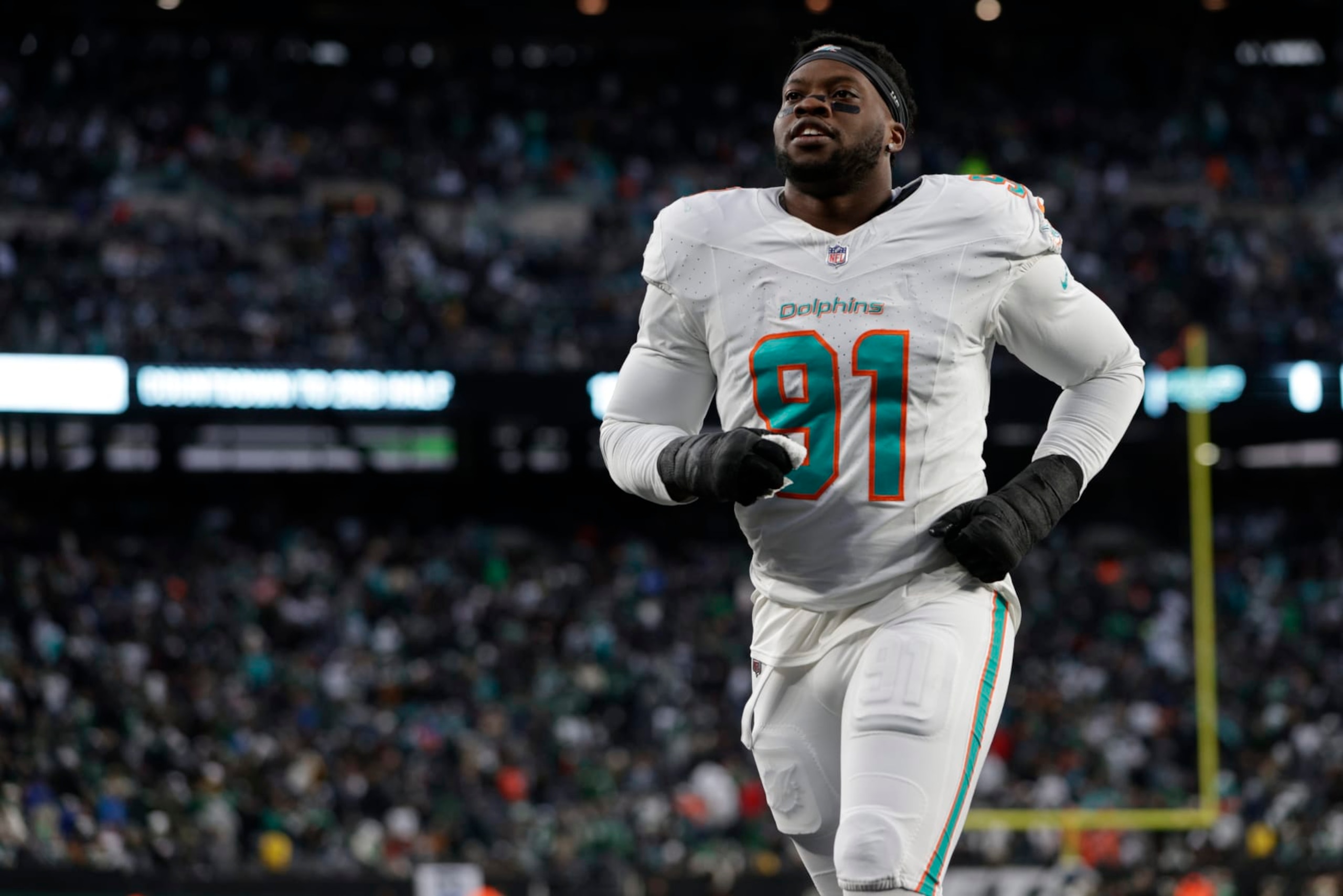 EAST RUTHERFORD, NEW JERSEY - NOVEMBER 24: Defensive end Emmanuel Ogbah #91 of the Miami Dolphins walks off the field at the end of the first half of a football game against the New York Jets at MetLife Stadium on November 24, 2023 in East Rutherford, New Jersey. (Photo by Rich Schultz/Getty Images) EAST RUTHERFORD, NEW JERSEY - NOVEMBER 24: Defensive end Emmanuel Ogbah #91 of the Miami Dolphins walks off the field at the end of the first half of a football game against the New York Jets at MetLife Stadium on November 24, 2023 in East Rutherford, New Jersey. (Photo by Rich Schultz/Getty Images)