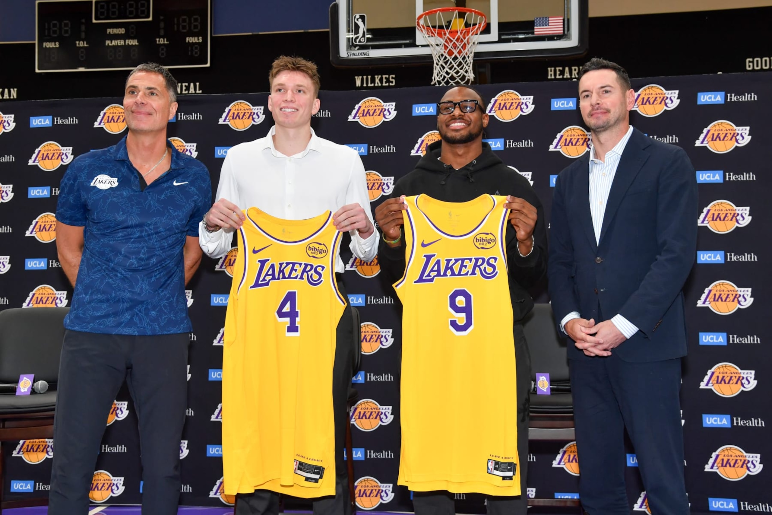 LOS ANGELES, CA - JULY 2: General Manager Rob Pelinka, Dalton Knecht, Bronny James and Head Coach JJ Reddick of the Los Angeles Lakers pose for a photo during a press conference on July 2, 2024 at UCLA Health Training Center in El Segundo, California. NOTE TO USER: User expressly acknowledges and agrees that, by downloading and/or using this Photograph, user is consenting to the terms and conditions of the Getty Images License Agreement. Mandatory Copyright Notice: Copyright 2024 NBAE (Photo by Juan Ocampo/NBAE via Getty Images)