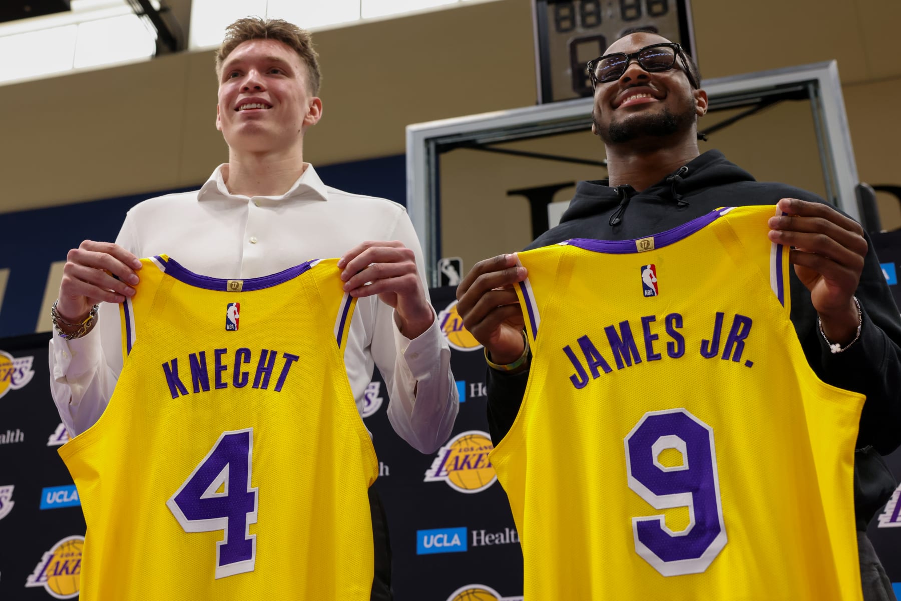 Bronny James and Dalton Knecht Don Lakers Jerseys following 2024 NBA Draft