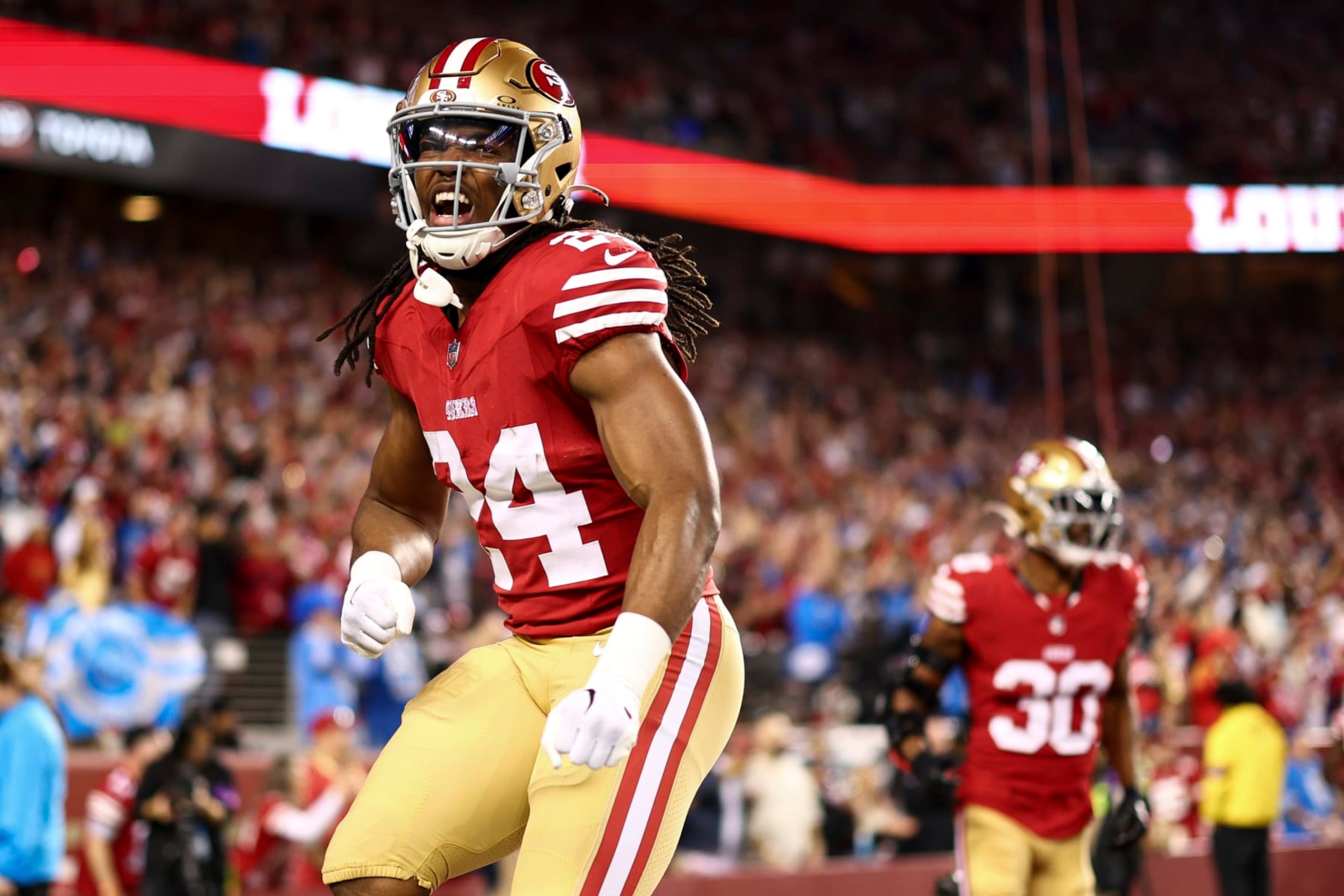 SANTA CLARA, CA - JANUARY 28: Jordan Mason #24 of the San Francisco 49ers celebrates after a play during the NFC Championship NFL football game against the Detroit Lions at Levi's Stadium on January 28, 2024 in Santa Clara, California. (Photo by Kevin Sabitus/Getty Images)