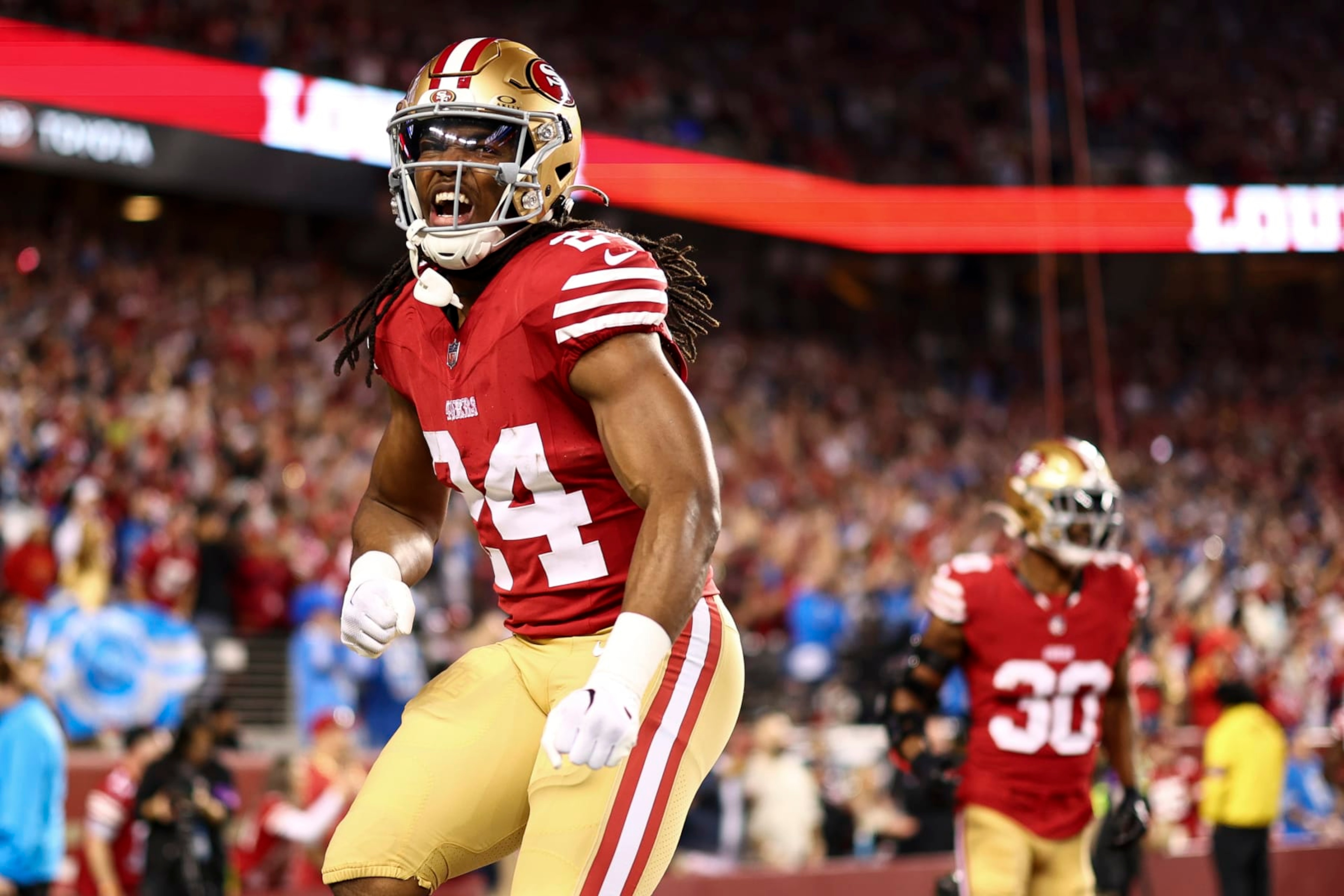 SANTA CLARA, CA - JANUARY 28: Jordan Mason #24 of the San Francisco 49ers celebrates after a play during the NFC Championship NFL football game against the Detroit Lions at Levi's Stadium on January 28, 2024 in Santa Clara, California. (Photo by Kevin Sabitus/Getty Images)