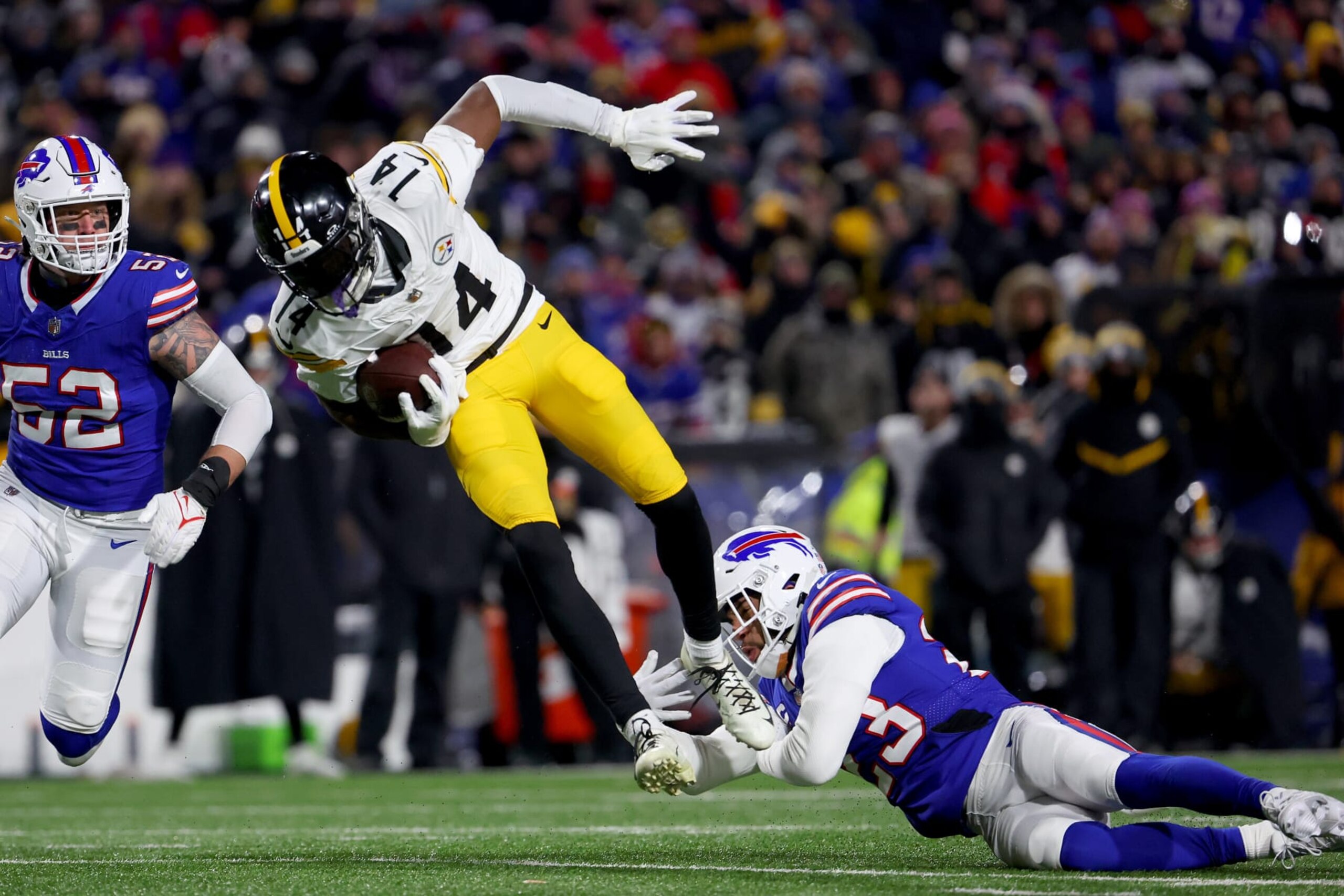 ORCHARD PARK, NEW YORK - JANUARY 15: George Pickens #14 of the Pittsburgh Steelers catches a pass against Micah Hyde #23 of the Buffalo Bills during the third quarter at Highmark Stadium on January 15, 2024 in Orchard Park, New York. (Photo by Timothy T Ludwig/Getty Images) ORCHARD PARK, NEW YORK - JANUARY 15: George Pickens #14 of the Pittsburgh Steelers catches a pass against Micah Hyde #23 of the Buffalo Bills during the third quarter at Highmark Stadium on January 15, 2024 in Orchard Park, New York. (Photo by Timothy T Ludwig/Getty Images)