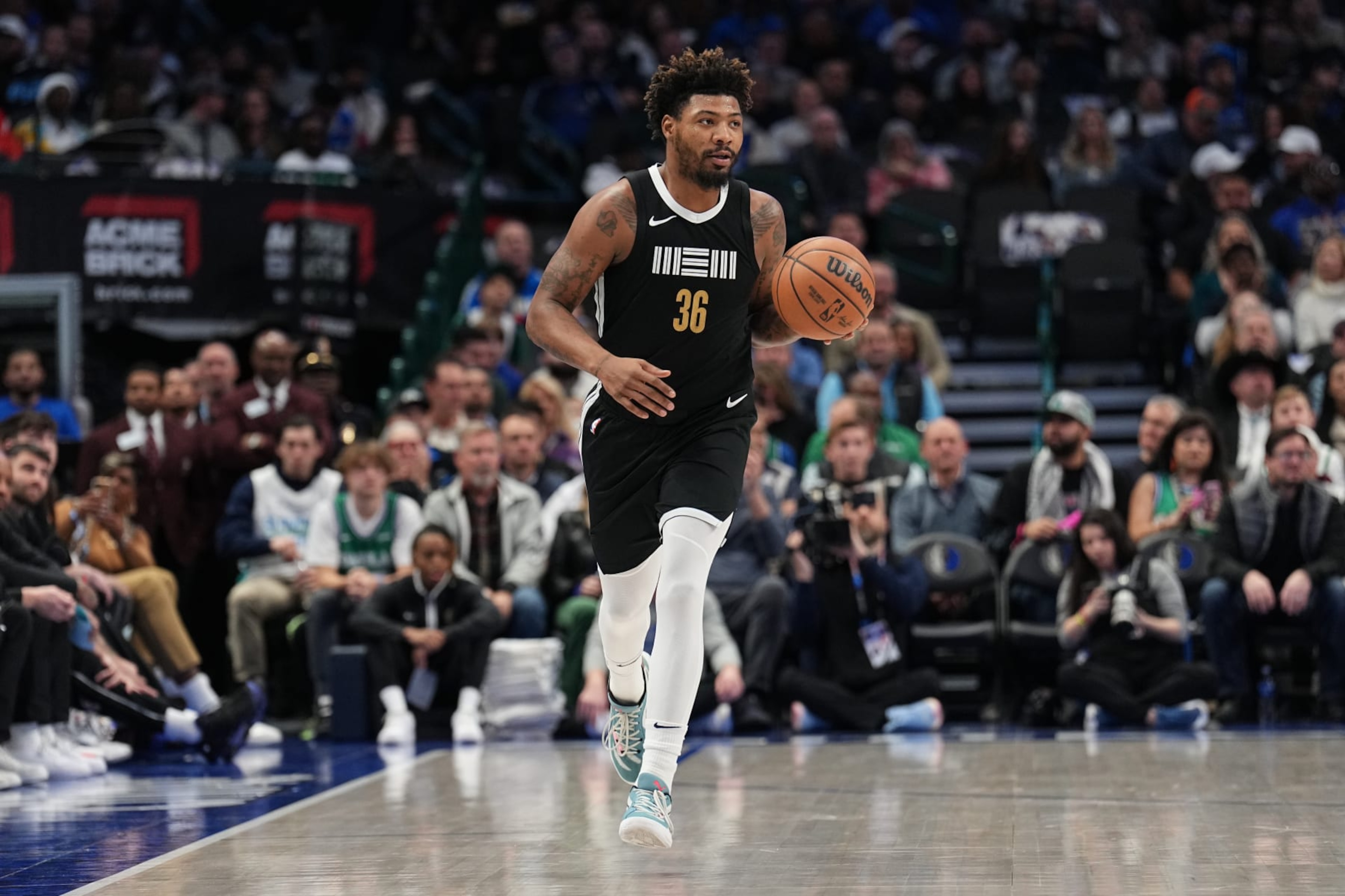 DALLAS, TX - JANUARY 9: Marcus Smart #36 of the Memphis Grizzlies dribbles the ball during the game against the Dallas Mavericks on January 9, 2024 at the American Airlines Center in Dallas, Texas. NOTE TO USER: User expressly acknowledges and agrees that, by downloading and or using this photograph, User is consenting to the terms and conditions of the Getty Images License Agreement. Mandatory Copyright Notice: Copyright 2024 NBAE (Photo by Glenn James/NBAE via Getty Images) DALLAS, TX - JANUARY 9: Marcus Smart #36 of the Memphis Grizzlies dribbles the ball during the game against the Dallas Mavericks on January 9, 2024 at the American Airlines Center in Dallas, Texas. NOTE TO USER: User expressly acknowledges and agrees that, by downloading and or using this photograph, User is consenting to the terms and conditions of the Getty Images License Agreement. Mandatory Copyright Notice: Copyright 2024 NBAE (Photo by Glenn James/NBAE via Getty Images)