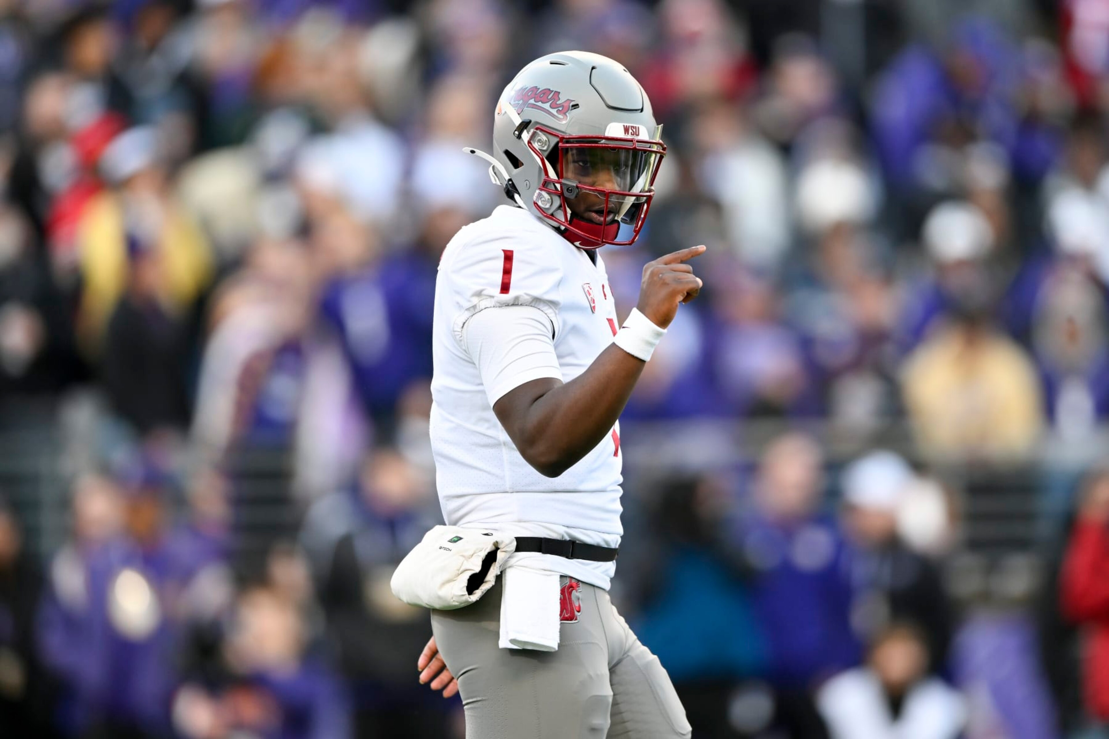 SEATTLE, WASHINGTON - NOVEMBER 25: Cameron Ward #1 of the Washington State Cougars gestures during the first quarter against the Washington Huskies at Husky Stadium on November 25, 2023 in Seattle, Washington. (Photo by Alika Jenner/Getty Images)