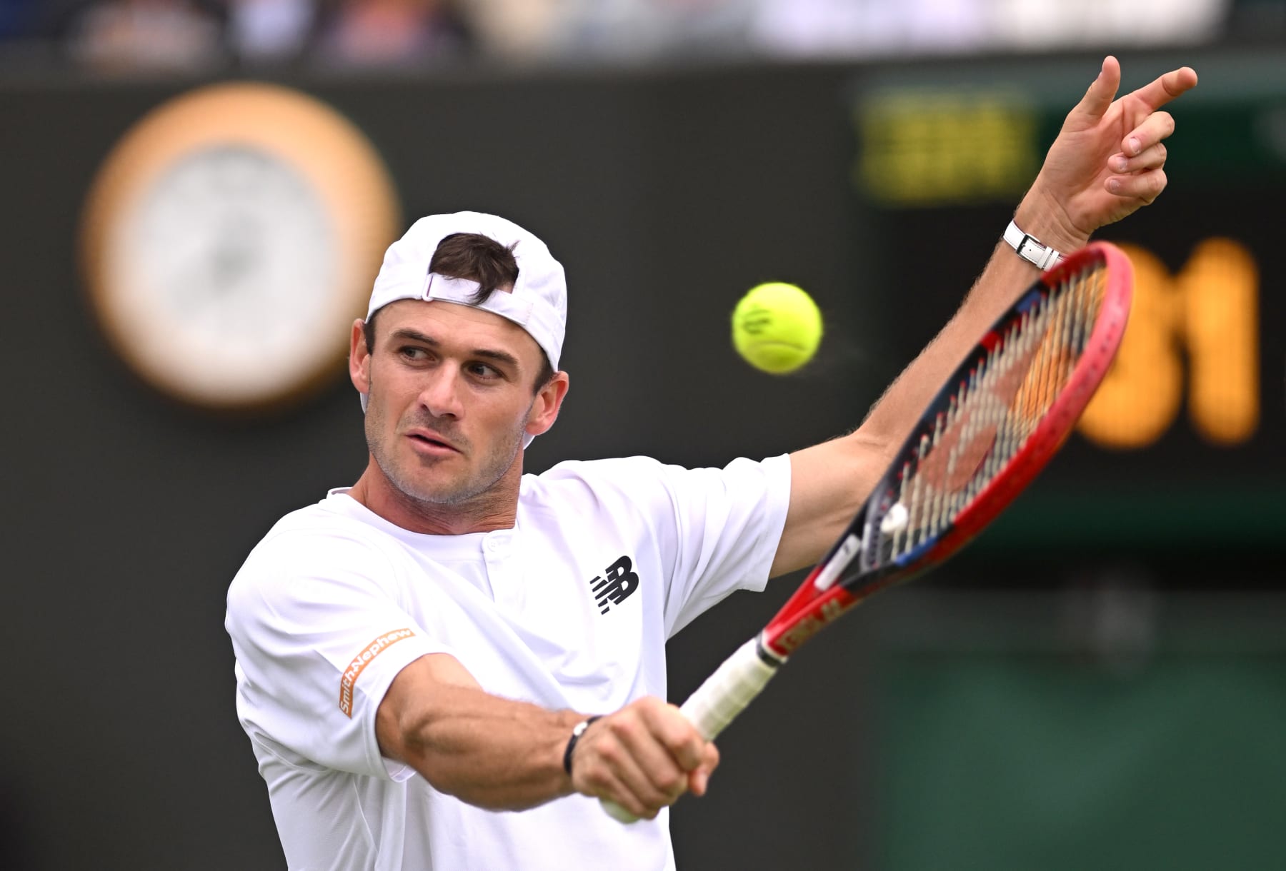 LONDON, ENGLAND - JULY 03: Tommy Paul of United States plays a backhand against Otto Virtanen of Finland in the Gentlemen's Singles second round match during day three of The Championships Wimbledon 2024 at All England Lawn Tennis and Croquet Club on July 03, 2024 in London, England. (Photo by Mike Hewitt/Getty Images)