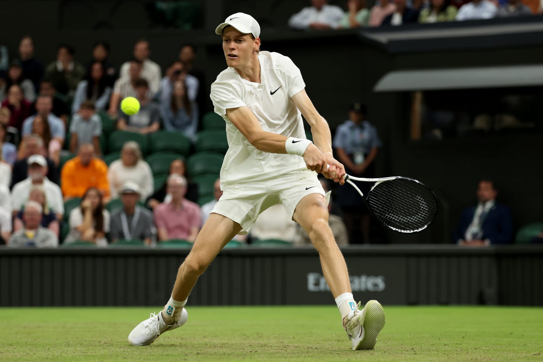 LONDON, ENGLAND - JULY 03: Jannik Sinner of Italy plays a backhand against Matteo Berrettini of Italy in his Gentlemen's Singles second round match during day three of The Championships Wimbledon 2024 at All England Lawn Tennis and Croquet Club on July 03, 2024 in London, England. (Photo by Sean M. Haffey/Getty Images)