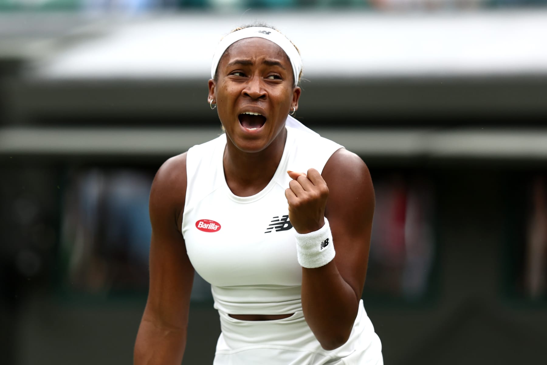 LONDON, ENGLAND - JULY 03: Coco Gauff of United States celebrates as she plays against Anca Todoni of Romania in her Ladies' Singles second round match during day three of The Championships Wimbledon 2024 at All England Lawn Tennis and Croquet Club on July 03, 2024 in London, England. (Photo by Francois Nel/Getty Images)