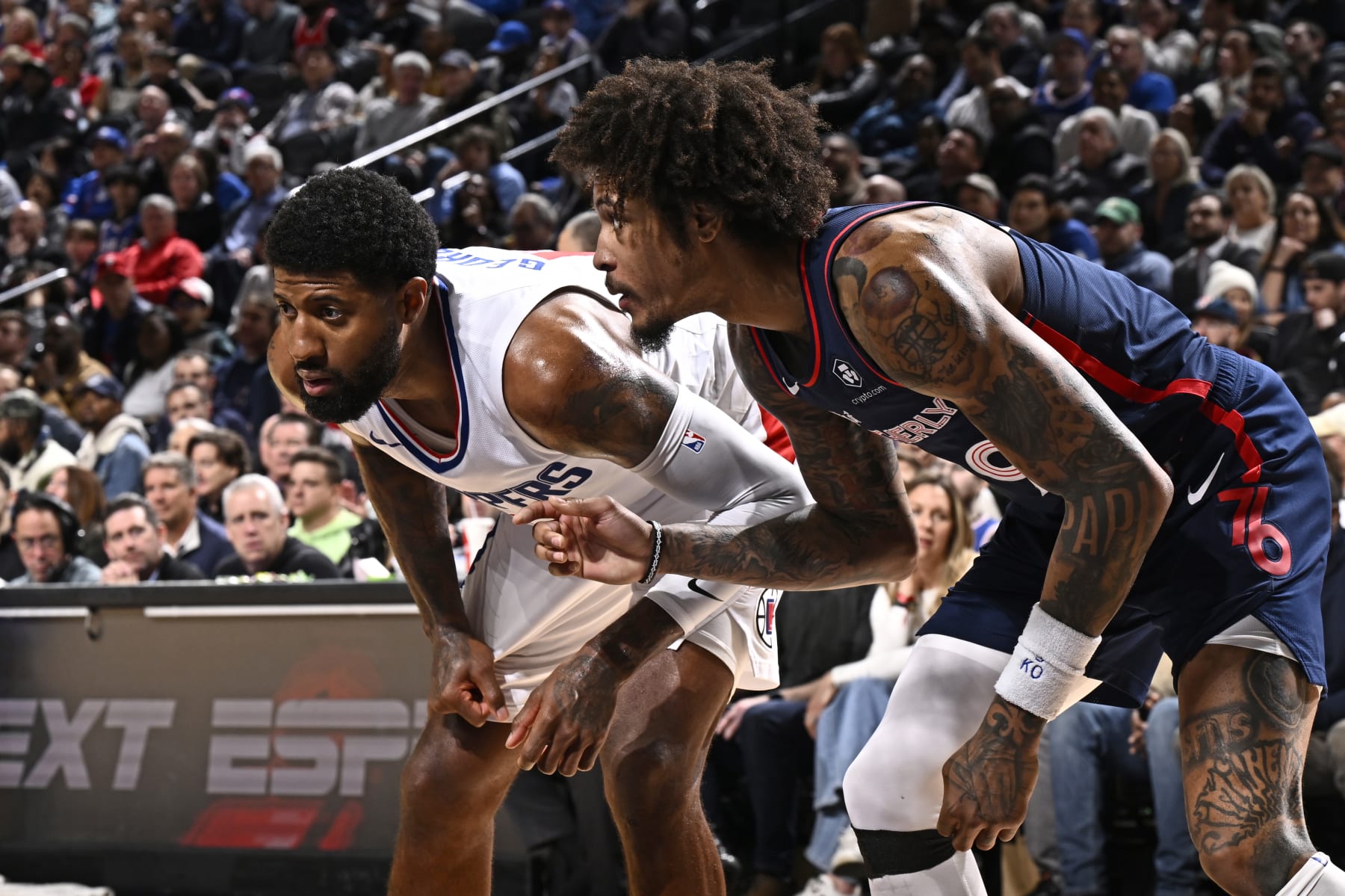 PHILADELPHIA, PA - MARCH 27: Paul George #13 of the LA Clippers and Kelly Oubre Jr. #9 of the Philadelphia 76ers wait for a rebound during the game  on March 27, 2024 at the Wells Fargo Center in Philadelphia, Pennsylvania NOTE TO USER: User expressly acknowledges and agrees that, by downloading and/or using this Photograph, user is consenting to the terms and conditions of the Getty Images License Agreement. Mandatory Copyright Notice: Copyright 2024 NBAE (Photo by David Dow/NBAE via Getty Images)