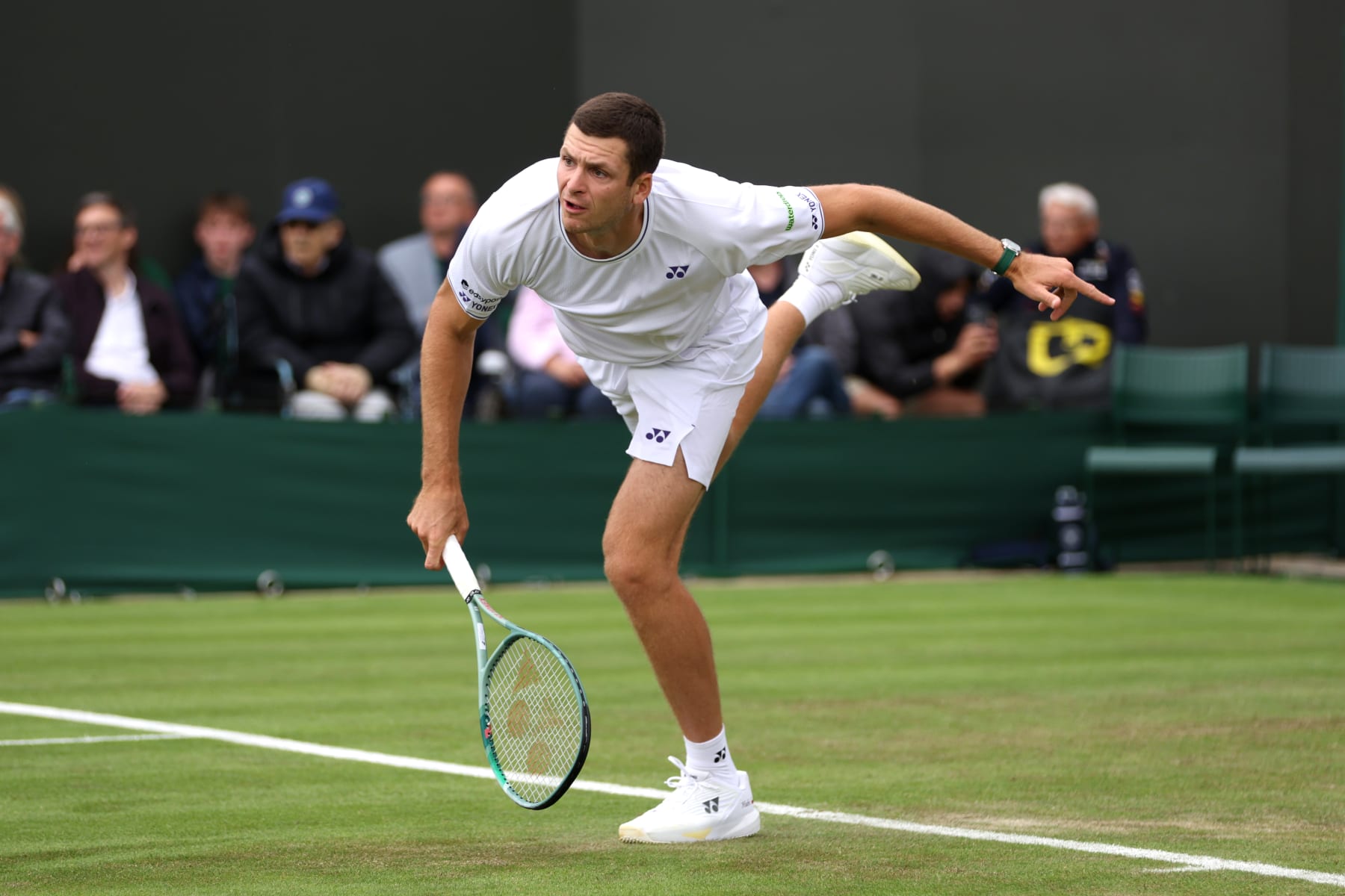 LONDON, ENGLAND - JULY 02: Hubert Hurkacz of Poland serves to Radu Albot of Moldova in his Gentlemen's Singles first round match during day two of The Championships Wimbledon 2024 at All England Lawn Tennis and Croquet Club on July 02, 2024 in London, England. (Photo by Clive Brunskill/Getty Images)