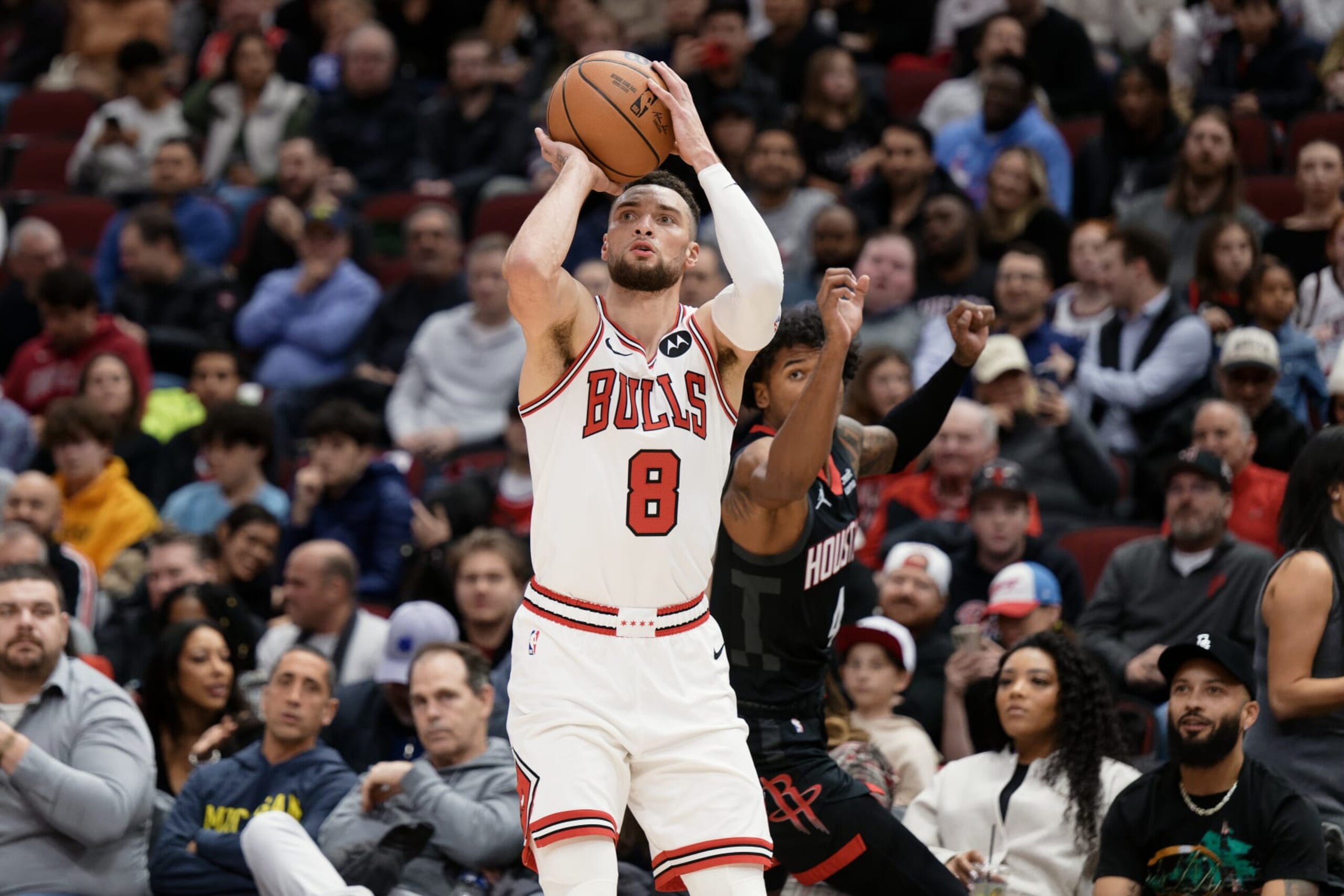 CHICAGO, ILLINOIS - JANUARY 10:  Zach Lavine #8 of the Chicago Bulls controls the ball against the Houston Rockets on January 10, 2024 at United Center in Chicago, Illinois.  NOTE TO USER: User expressly acknowledges and agrees that, by downloading and or using this photograph, User is consenting to the terms and conditions of the Getty Images License Agreement.  (Photo by Jamie Sabau/Getty Images)