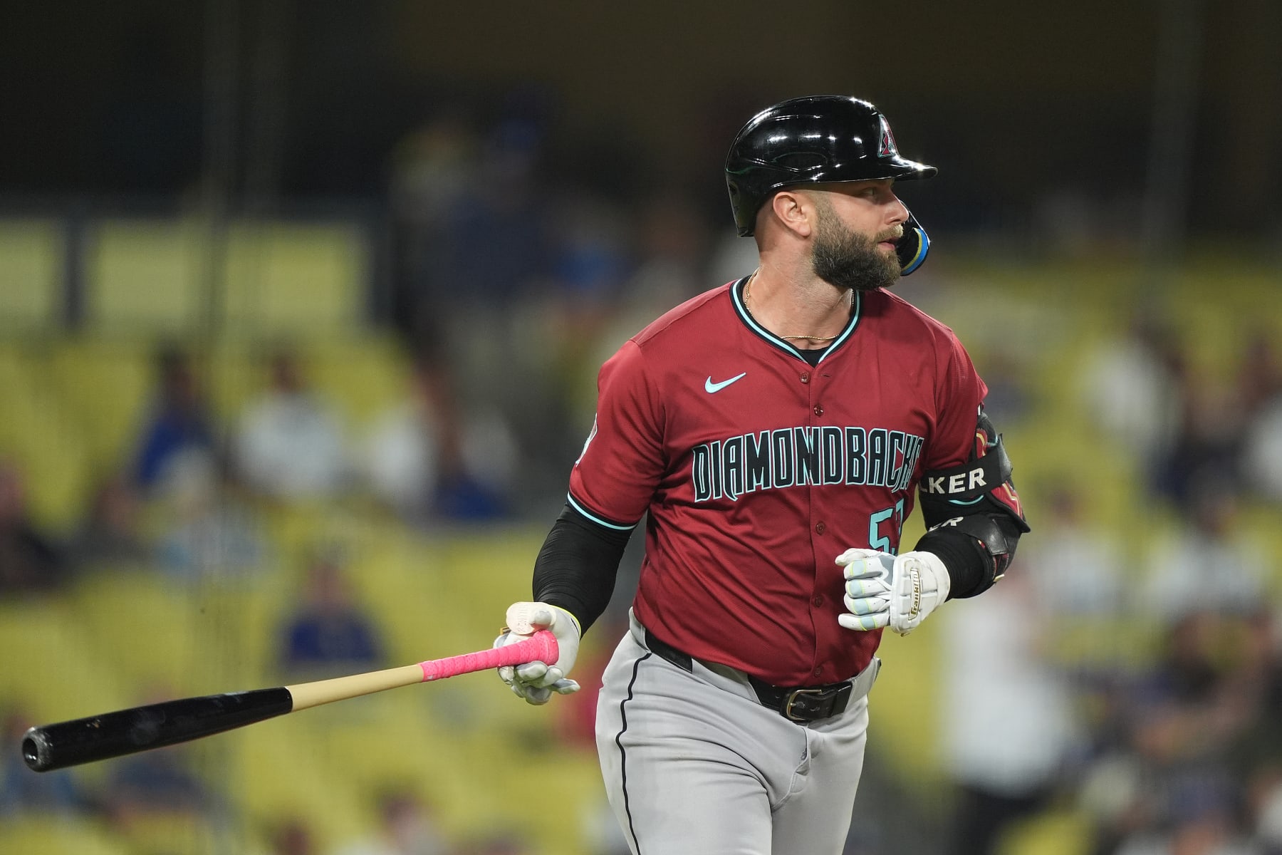LOS ANGELES, CALIFORNIA - JULY 03: Christian Walker #53 of the Arizona Diamondbacks looks on as he hits a three run home run against the Los Angeles Dodgers during the ninth inning at Dodger Stadium on July 03, 2024 in Los Angeles, California. (Photo by Michael Owens/Getty Images)