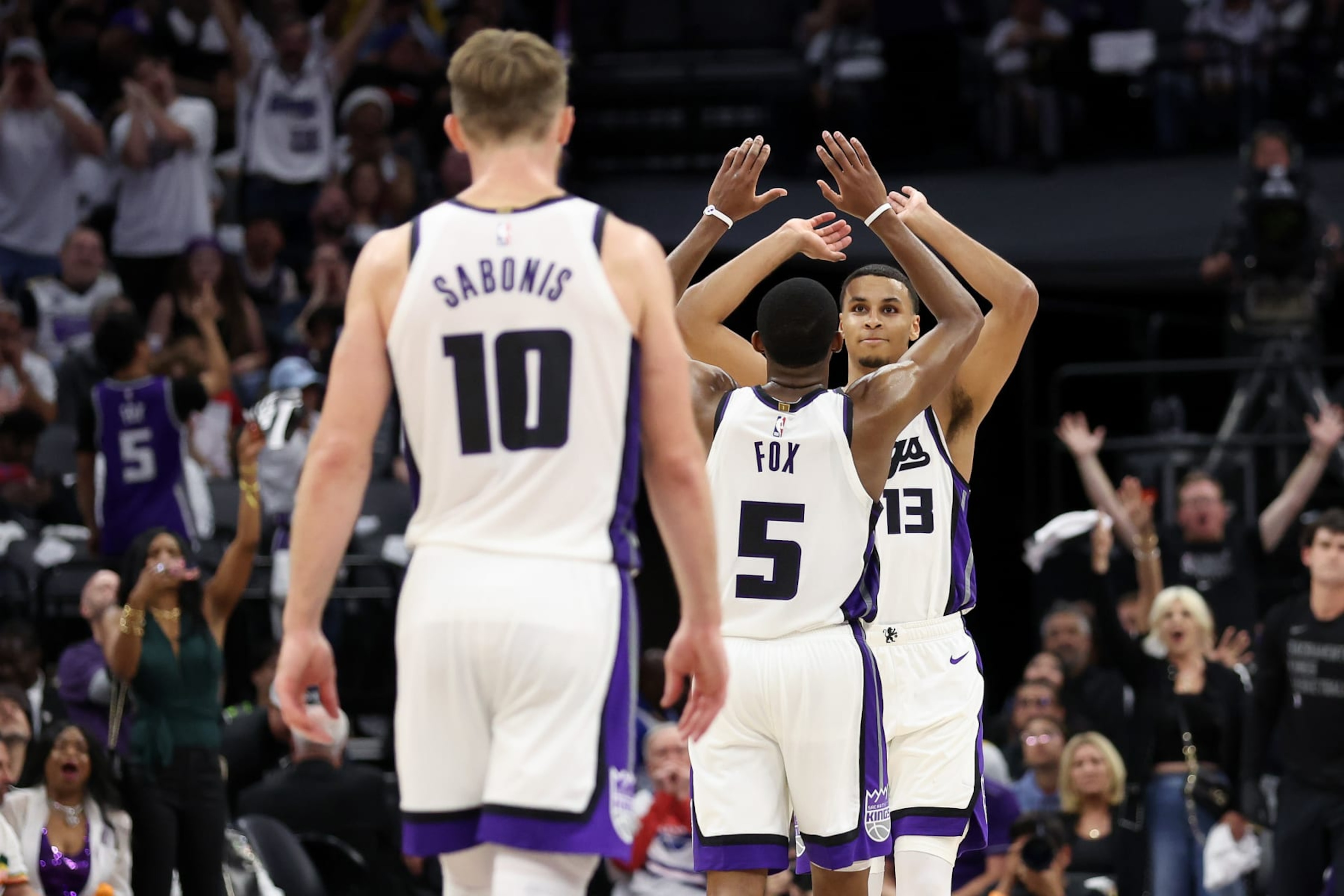 Domantas Sabonis, De'Aaron Fox and Keegan Murray