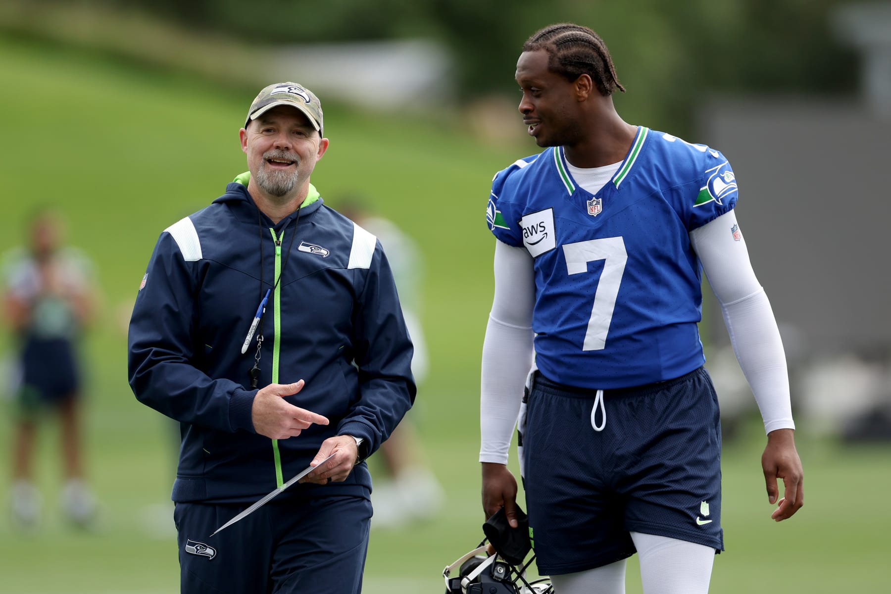 Seahawks offensive coordinator Ryan Grubb and quarterback Geno Smith