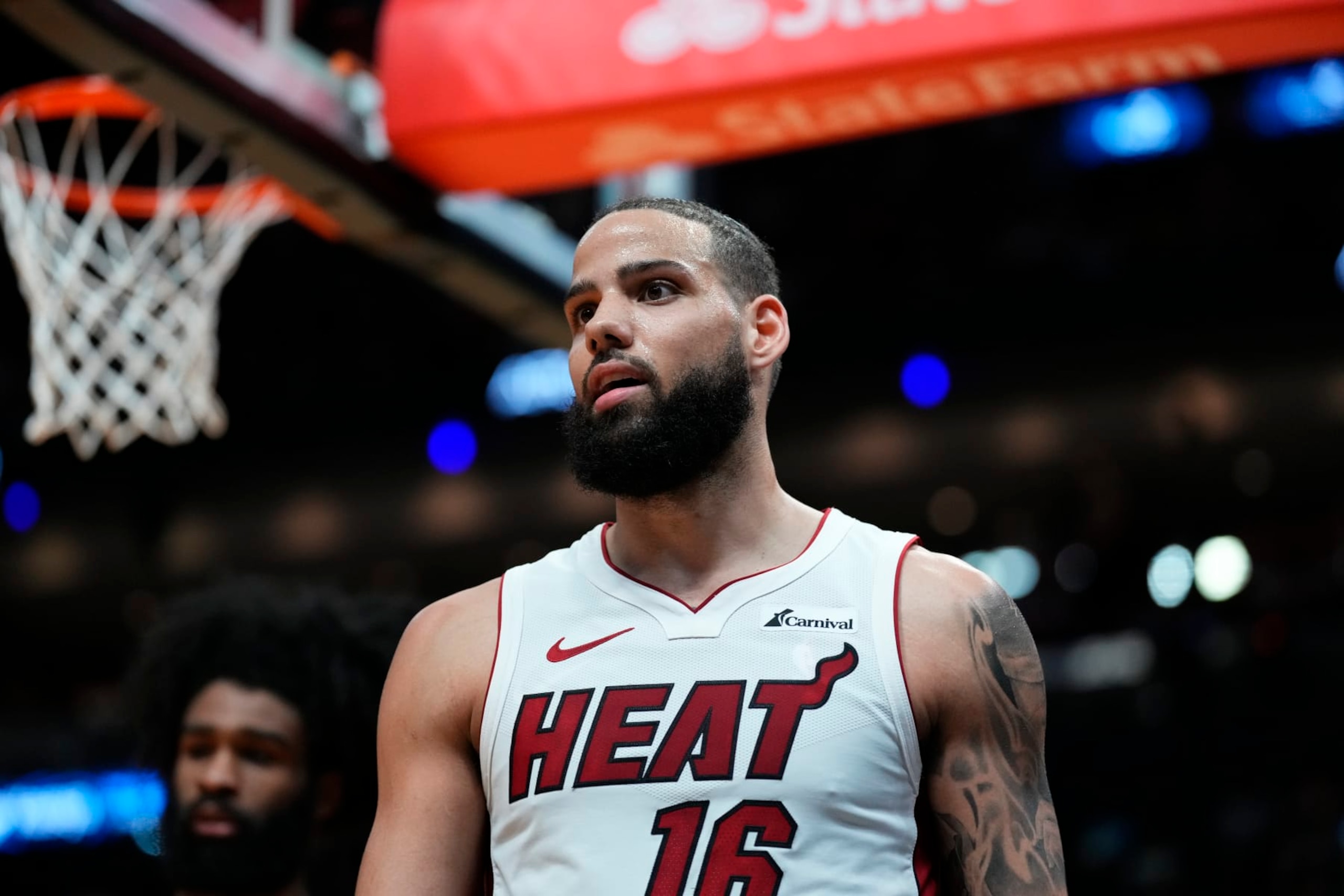MIAMI, FLORIDA - APRIL 19: Caleb Martin #16 of the Miami Heat looks on against the Chicago Bulls in the second quarter during the Play-In Tournament at Kaseya Center on April 19, 2024 in Miami, Florida. NOTE TO USER: User expressly acknowledges and agrees that, by downloading and or using this photograph, User is consenting to the terms and conditions of the Getty Images License Agreement. (Photo by Rich Storry/Getty Images)
