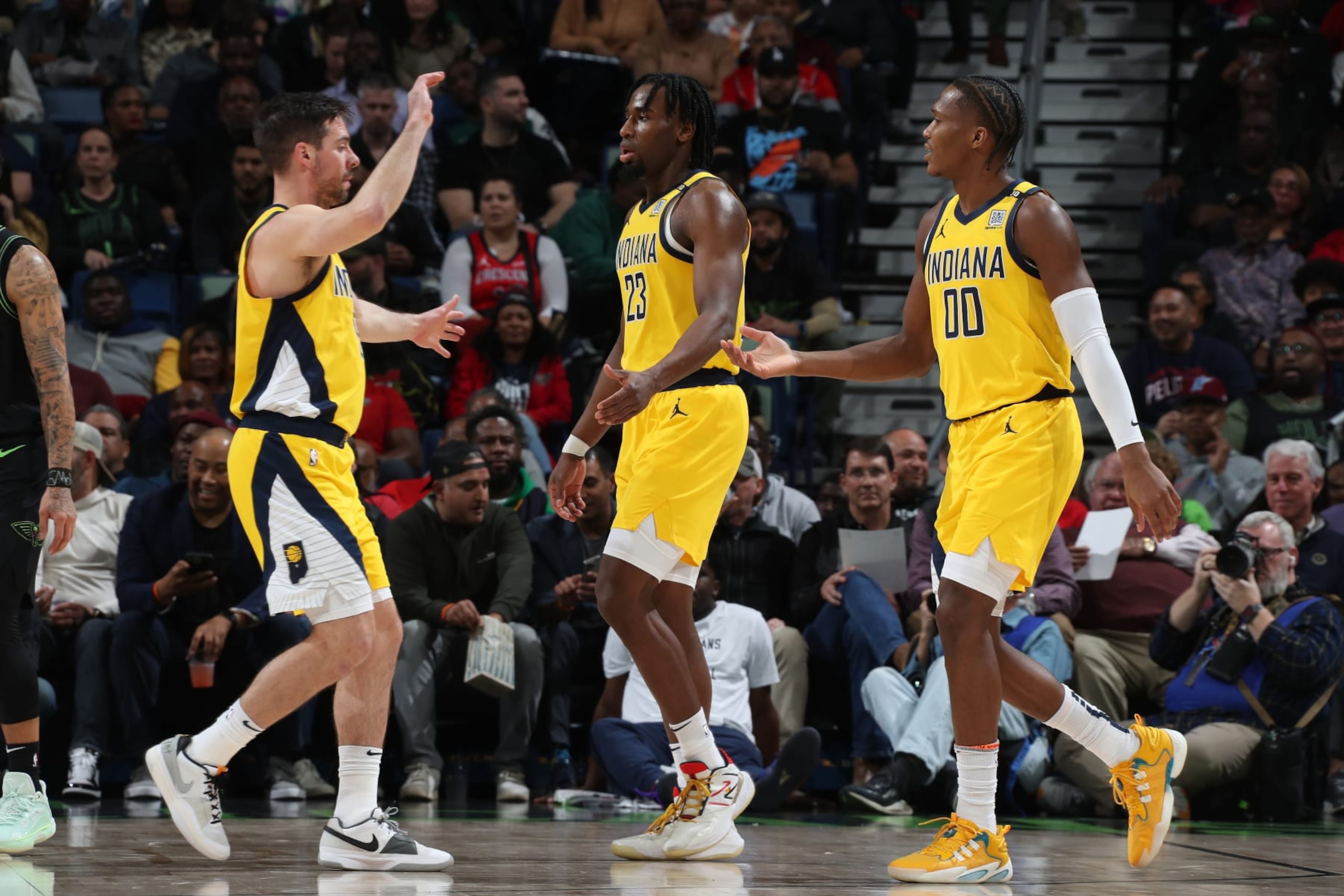 T.J. McConnell, Aaron Nesmith and Bennedict Mathurin