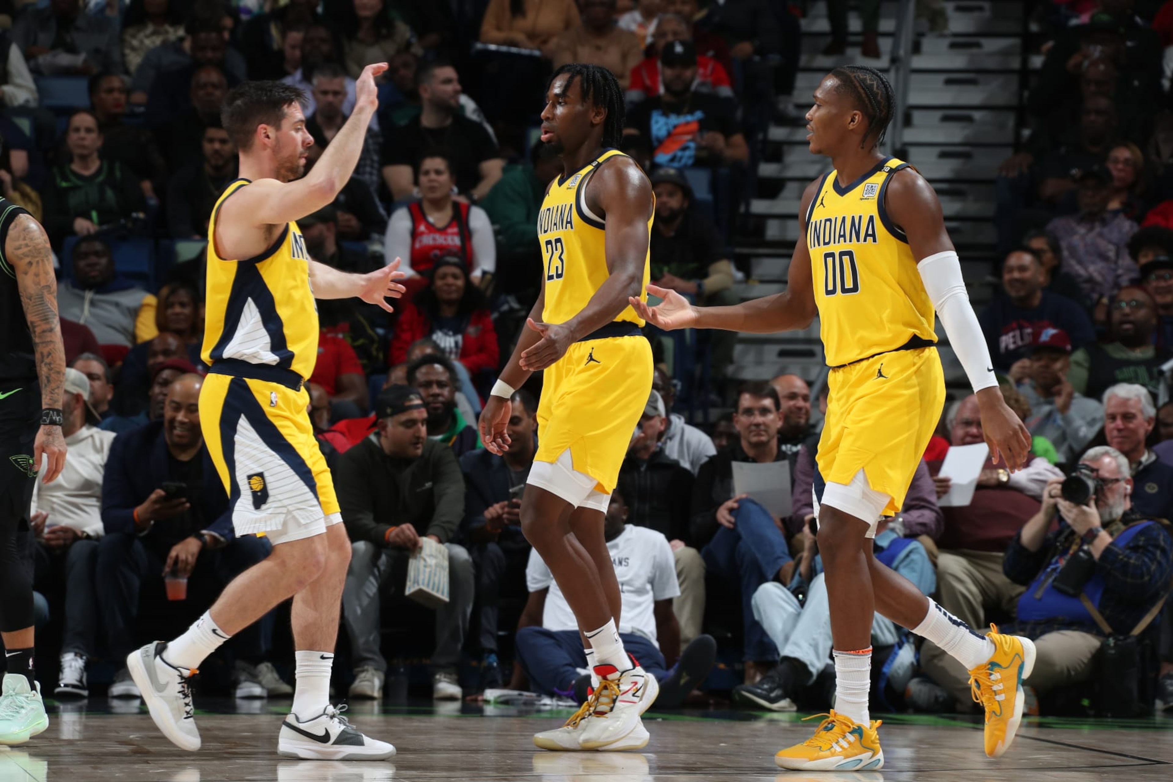 T.J. McConnell, Aaron Nesmith and Bennedict Mathurin