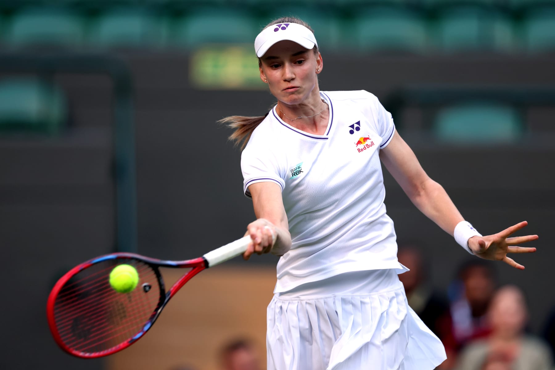 LONDON, ENGLAND - JULY 06: Elena Rybakina of Kazakhstan plays a forehand against Caroline Wozniacki of Denmark in her Ladies' Singles third round match during day six of The Championships Wimbledon 2024 at All England Lawn Tennis and Croquet Club on July 06, 2024 in London, England. (Photo by Clive Brunskill/Getty Images)