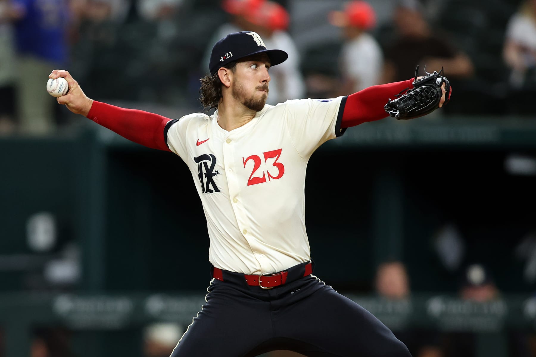 ARLINGTON, TEXAS - JULY 05: Michael Lorenzen #23 of the Texas Rangers throws a pitch in the first inning against the Tampa Bay Rays at Globe Life Field on July 05, 2024 in Arlington, Texas. (Photo by Tim Heitman/Getty Images)
