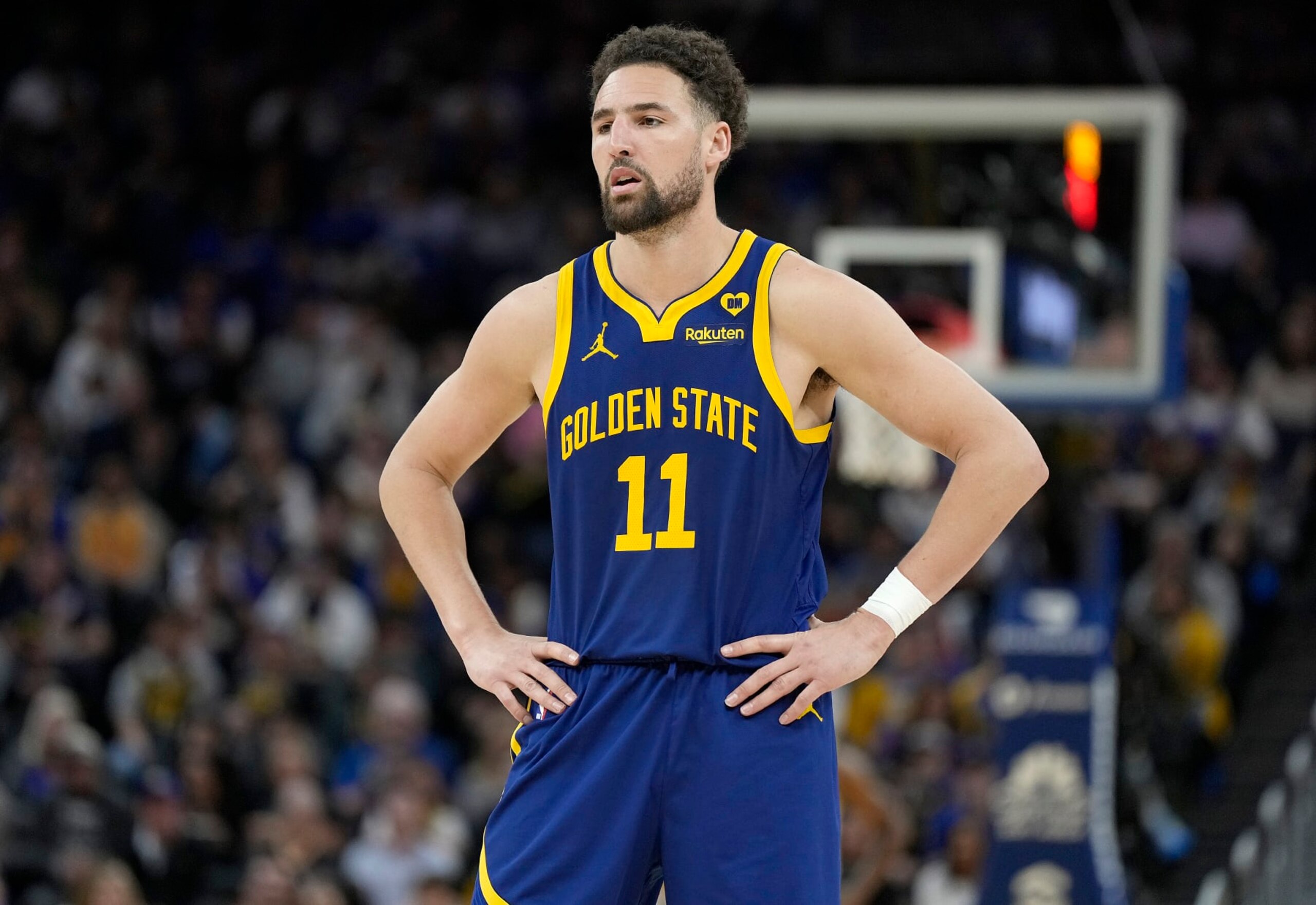 SAN FRANCISCO, CALIFORNIA - APRIL 07: Klay Thompson #11 of the Golden State Warriors looks on against the Utah Jazz during the second half of an NBA basketball game at Chase Center on April 07, 2024 in San Francisco, California. NOTE TO USER: User expressly acknowledges and agrees that, by downloading and or using this photograph, User is consenting to the terms and conditions of the Getty Images License Agreement. (Photo by Thearon W. Henderson/Getty Images)