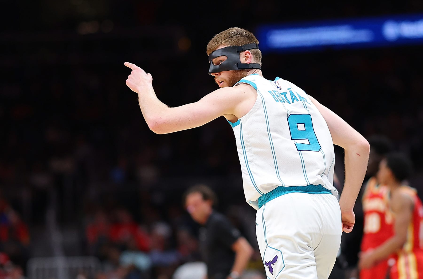 ATLANTA, GEORGIA - APRIL 10:  Davis Bertans #9 of the Charlotte Hornets reacts after a basket against the Atlanta Hawks during the fourth quarter at State Farm Arena on April 10, 2024 in Atlanta, Georgia.  NOTE TO USER: User expressly acknowledges and agrees that, by downloading and/or using this photograph, user is consenting to the terms and conditions of the Getty Images License Agreement.  (Photo by Kevin C. Cox/Getty Images)