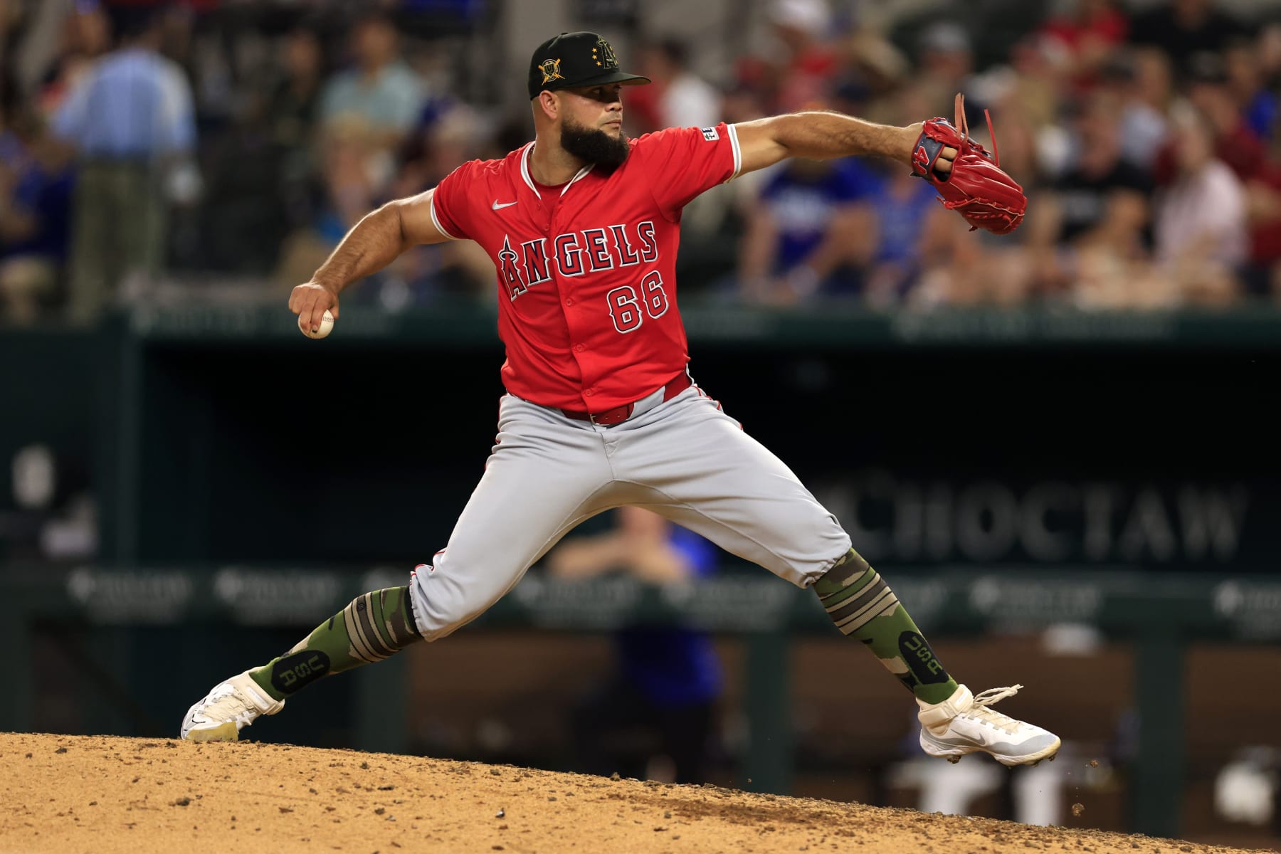 ARLINGTON, TX - MAY 18: Luis García #66 of the Los Angeles Angels pitches against the Texas Rangers during the game at Globe Life Field on May 18, 2024 in Arlington, Texas. (Photo by Ron Jenkins/Getty Images)