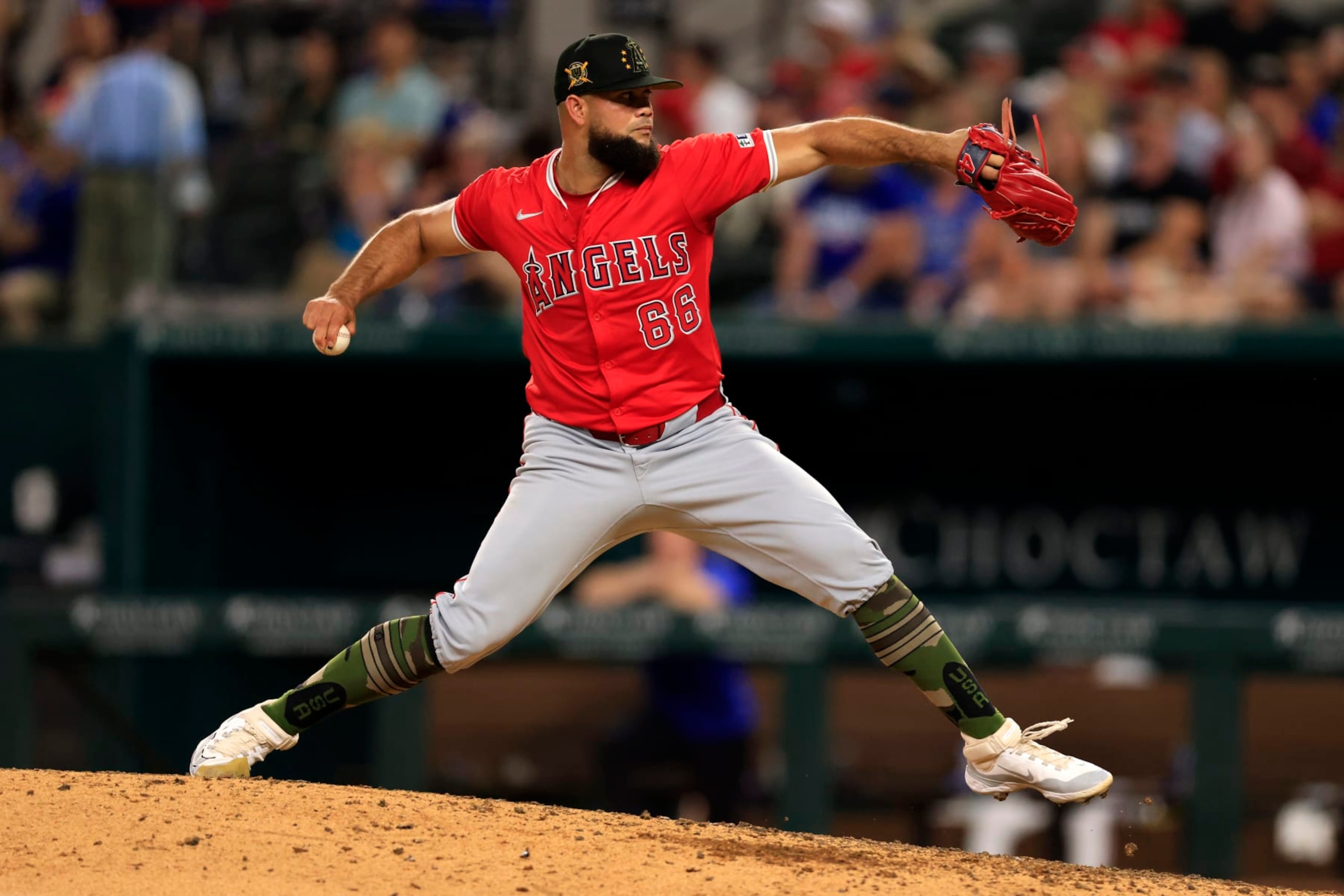 ARLINGTON, TX - MAY 18: Luis García #66 of the Los Angeles Angels pitches against the Texas Rangers during the game at Globe Life Field on May 18, 2024 in Arlington, Texas. (Photo by Ron Jenkins/Getty Images)
