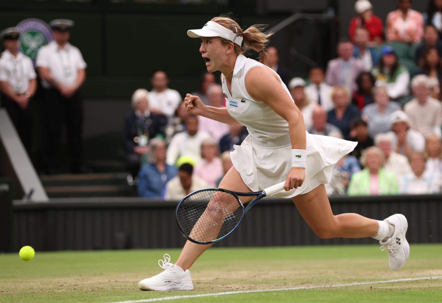 LONDON, ENGLAND - JULY 07: Lulu Sun of New Zealand celebrates match point as she plays against Emma Raducanu of Great Britain in her Ladies' Singles fourth round match during day seven of The Championships Wimbledon 2024 at All England Lawn Tennis and Croquet Club on July 07, 2024 in London, England. (Photo by Clive Brunskill/Getty Images)