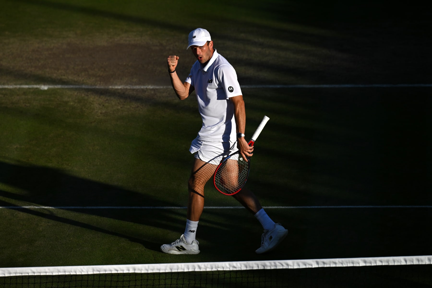 LONDON, ENGLAND - JULY 07: Tommy Paul of United States celebrates a point against Roberto Bautista Agut of Spain in his Gentlemen's Singles fourth round match during day seven of The Championships Wimbledon 2024 at All England Lawn Tennis and Croquet Club on July 07, 2024 in London, England. (Photo by Mike Hewitt/Getty Images)