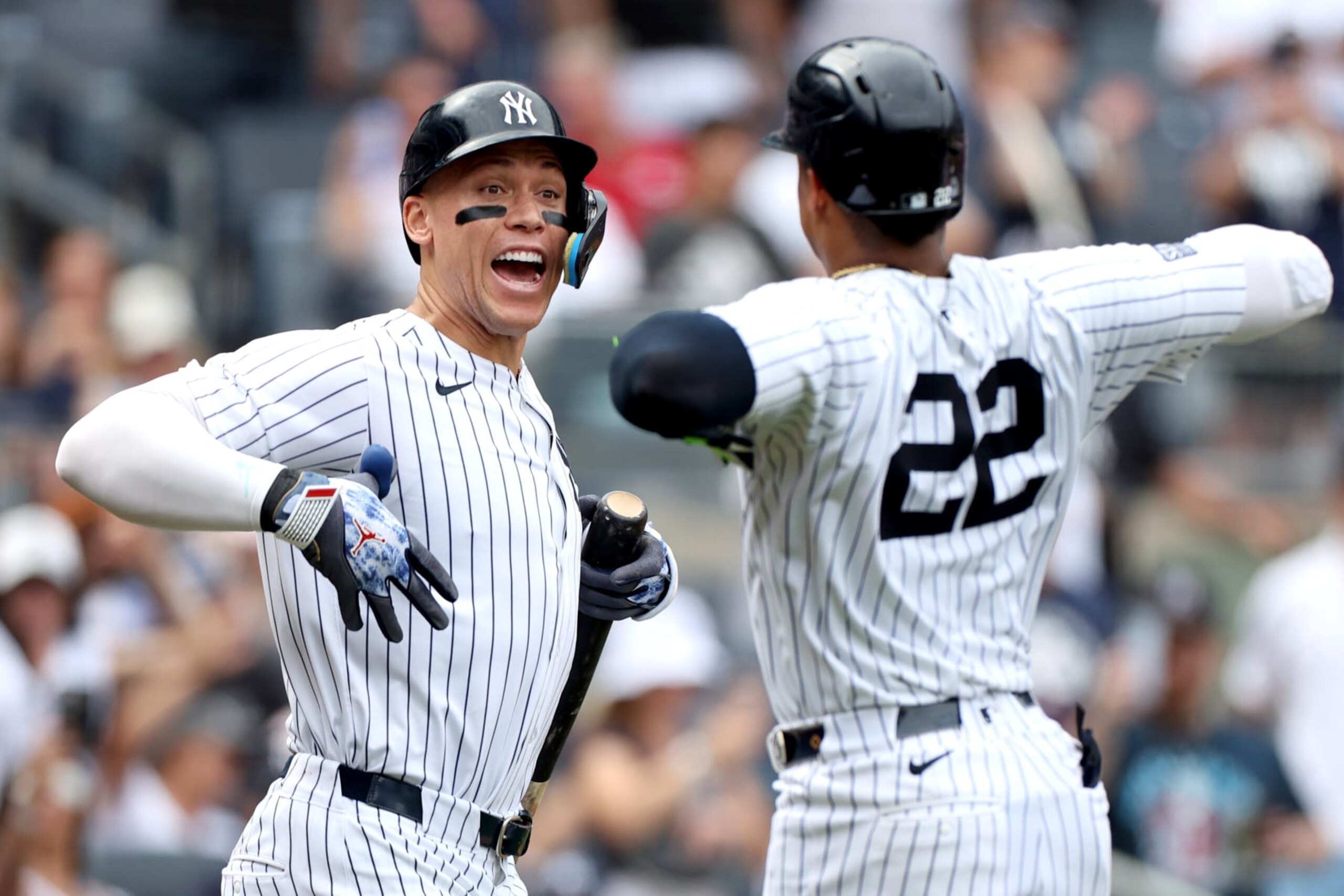 NEW YORK, NEW YORK - JULY 04: (L-R) Aaron Judge #99 and Juan Soto #22 of the New York Yankees react after a two-run home run against the Cincinnati Reds during the seventh inning at Yankee Stadium on July 04, 2024 in the Bronx borough of New York City. (Photo by Luke Hales/Getty Images)