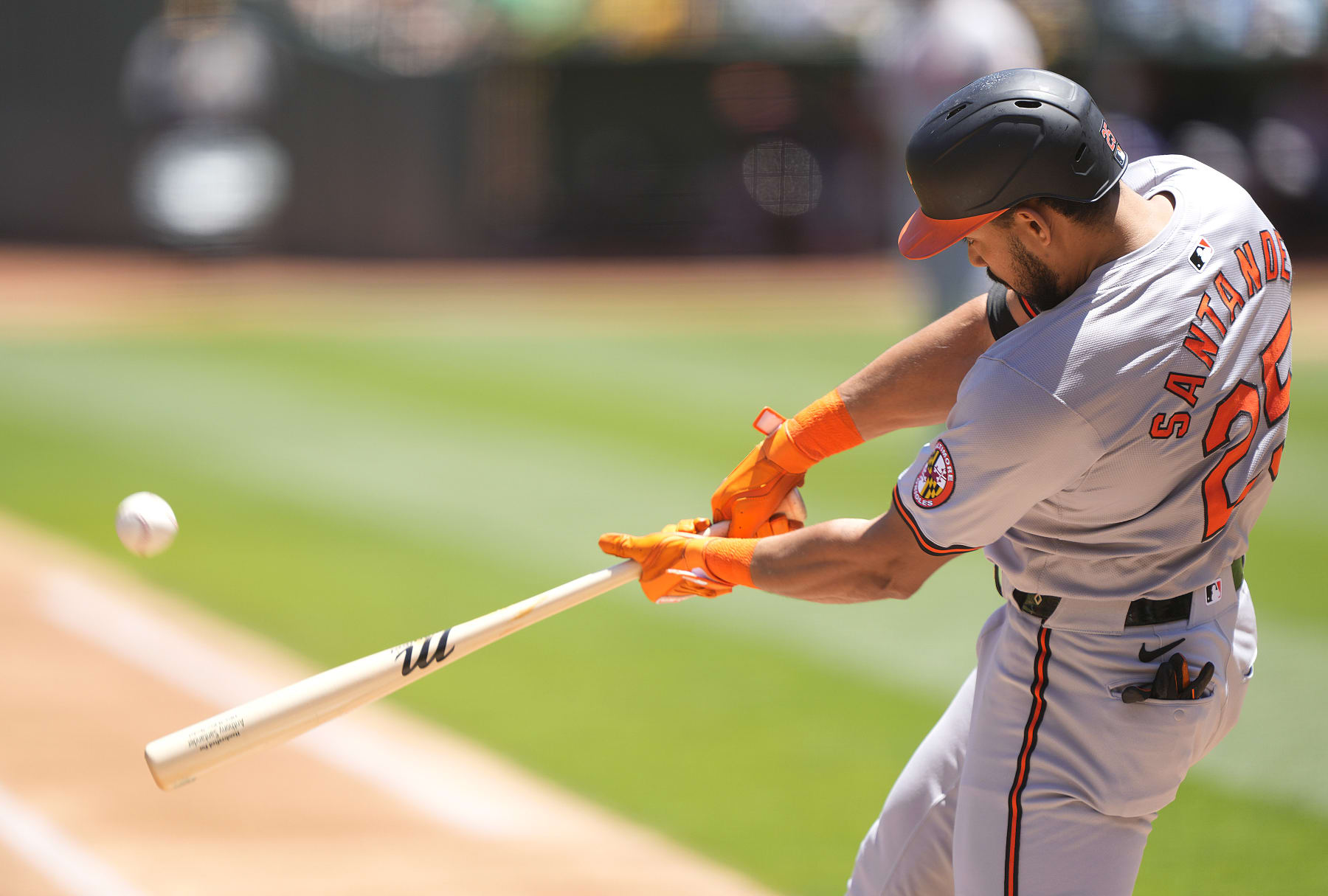 OAKLAND, CALIFORNIA - JULY 07: Anthony Santander #25 of the Baltimore Orioles hits a solo home run against the Oakland Athletics in the top of the first inning on July 7, 2024 at the Oakland Coliseum in Oakland, California. (Photo by Thearon W. Henderson/Getty Images)