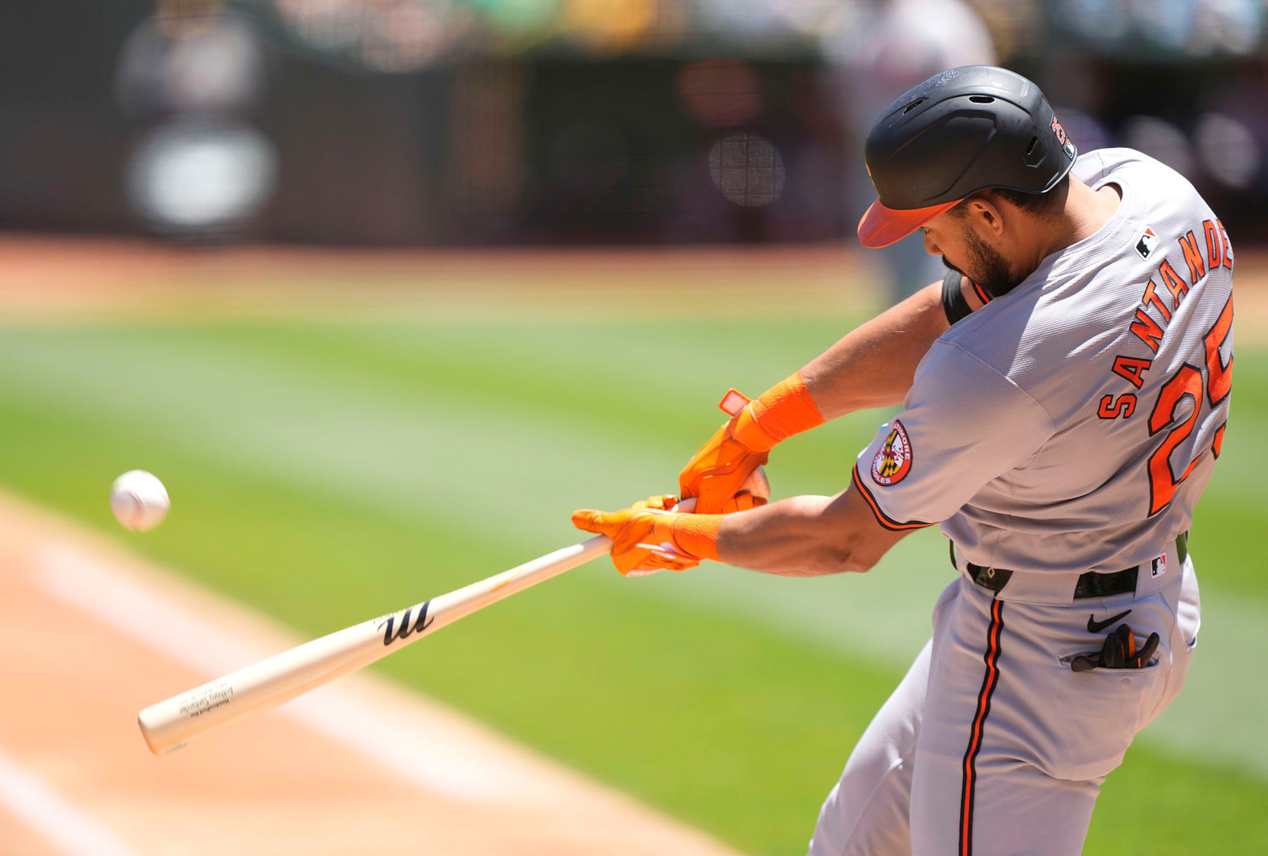 OAKLAND, CALIFORNIA - JULY 07: Anthony Santander #25 of the Baltimore Orioles hits a solo home run against the Oakland Athletics in the top of the first inning on July 7, 2024 at the Oakland Coliseum in Oakland, California. (Photo by Thearon W. Henderson/Getty Images)