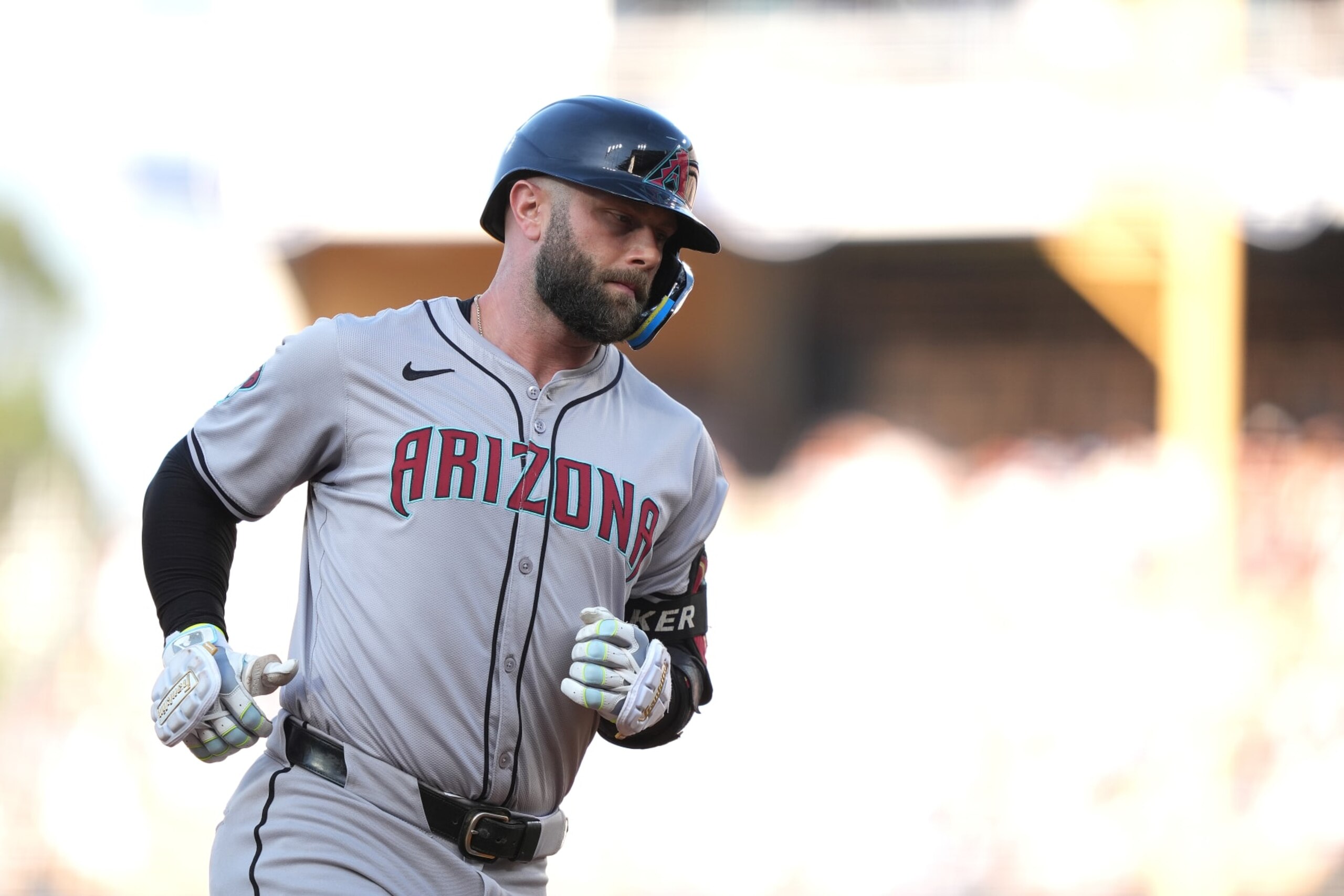 LOS ANGELES, CALIFORNIA - JULY 04: Christian Walker #53 of the Arizona Diamondbacks rounds the bases on a solo home run against the Los Angeles Dodgers during the first inning at Dodger Stadium on July 04, 2024 in Los Angeles, California. (Photo by Michael Owens/Getty Images)
