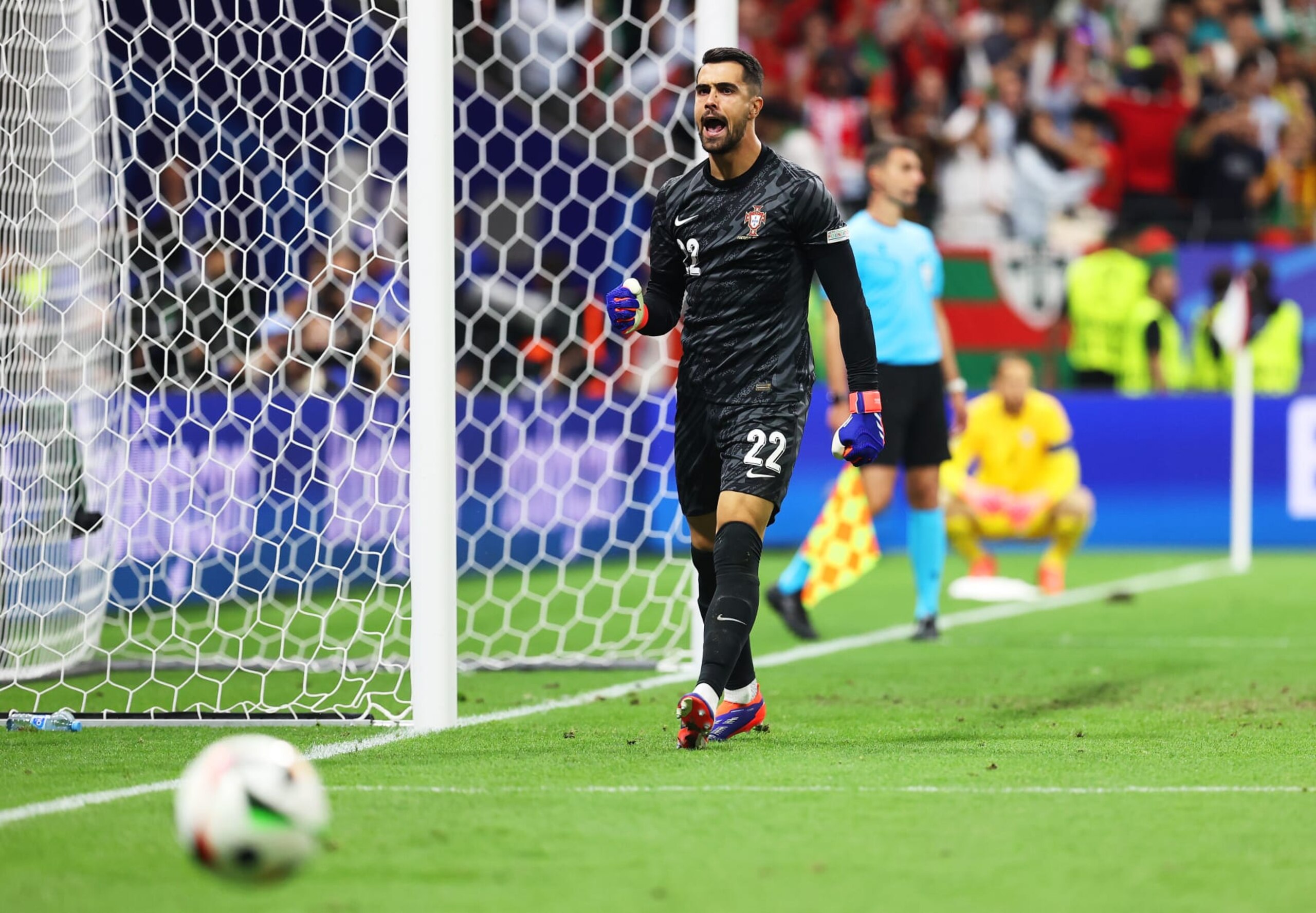 FRANKFURT AM MAIN, GERMANY - JULY 01: Diogo Costa of Portugal celebrates after saving the third penalty for Slovenia which was taken by Benjamin Verbic of Slovenia (not pictured) during the UEFA EURO 2024 round of 16 match between Portugal and Slovenia at Frankfurt Arena on July 01, 2024 in Frankfurt am Main, Germany. (Photo by Ryan Pierse - UEFA/UEFA via Getty Images) FRANKFURT AM MAIN, GERMANY - JULY 01: Diogo Costa of Portugal celebrates after saving the third penalty for Slovenia which was taken by Benjamin Verbic of Slovenia (not pictured) during the UEFA EURO 2024 round of 16 match between Portugal and Slovenia at Frankfurt Arena on July 01, 2024 in Frankfurt am Main, Germany. (Photo by Ryan Pierse - UEFA/UEFA via Getty Images)