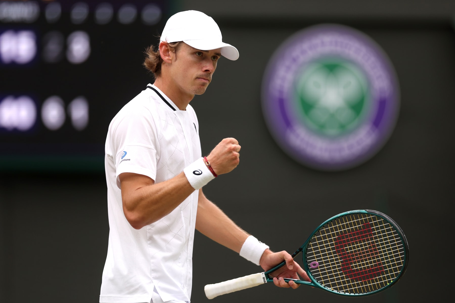 LONDON, ENGLAND - JULY 08: Alex de Minaur of Australia celebrates as he plays against Arthur Fils of France in his Gentlemen's Singles fourth round match during day eight of The Championships Wimbledon 2024 at All England Lawn Tennis and Croquet Club on July 08, 2024 in London, England. (Photo by Sean M. Haffey/Getty Images)