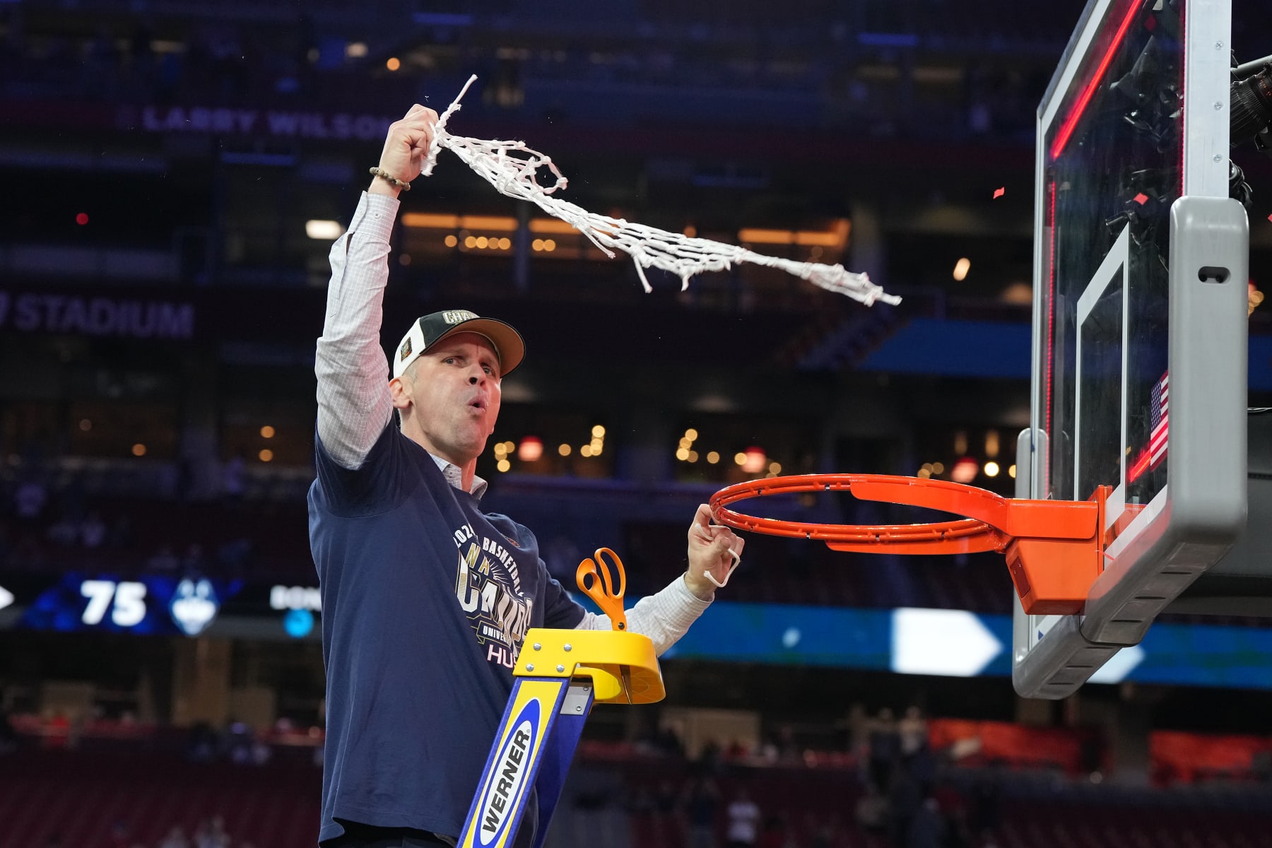 GLENDALE, ARIZONA - APRIL 08: Head coach Dan Hurley of the Connecticut Huskies celebrates after cutting the net after the National College Basketball Championship game against the Purdue Boilermakers at State Farm Stadium on April 08, 2024 in Glendale, Arizona. (Photo by Mitchell Layton/Getty Images)