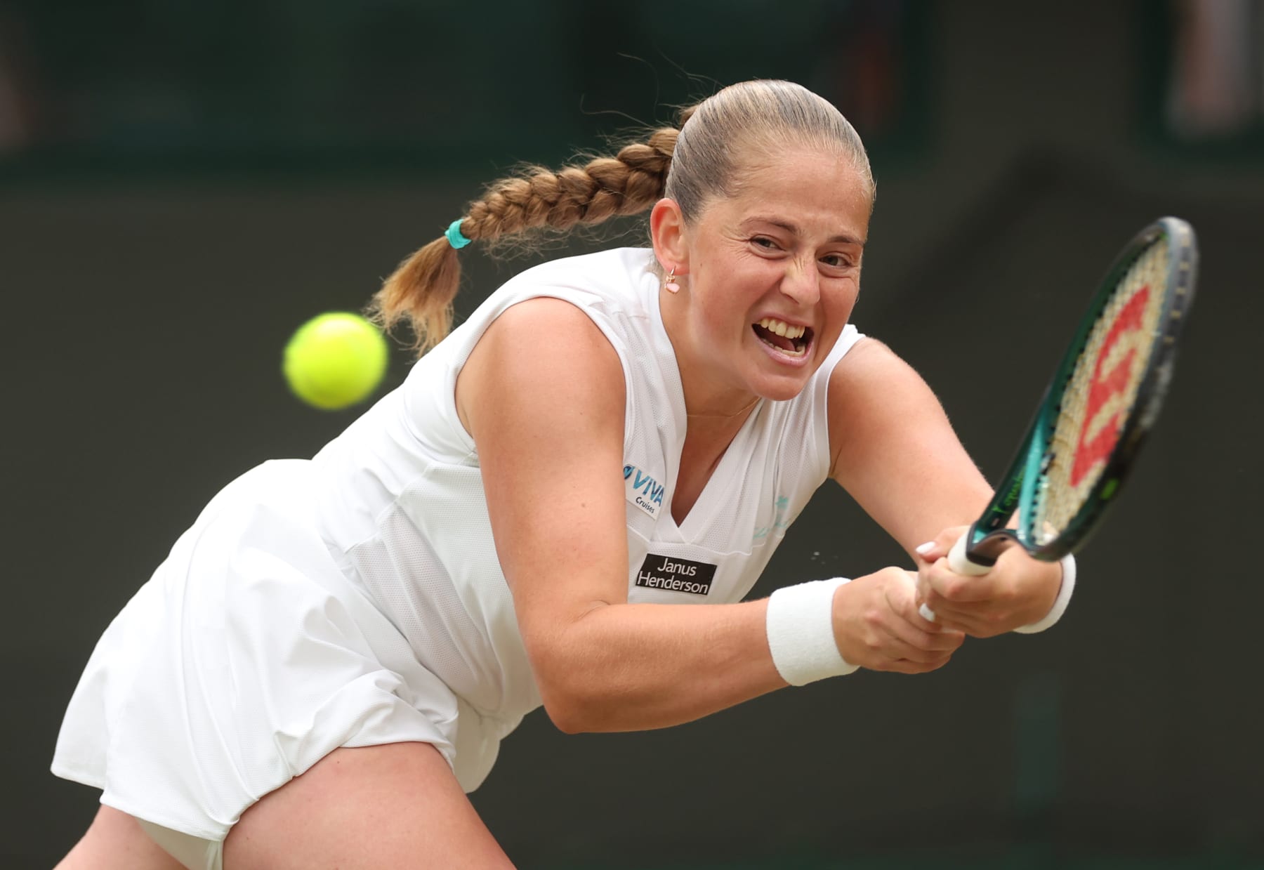 LONDON, ENGLAND - JULY 08: Jelena Ostapenko of Latvia plays a backhand against Yulia Putintseva of Kazakhstan in the Ladies' Singles fourth round match during day eight of The Championships Wimbledon 2024 at All England Lawn Tennis and Croquet Club on July 08, 2024 in London, England. (Photo by Sean M. Haffey/Getty Images)