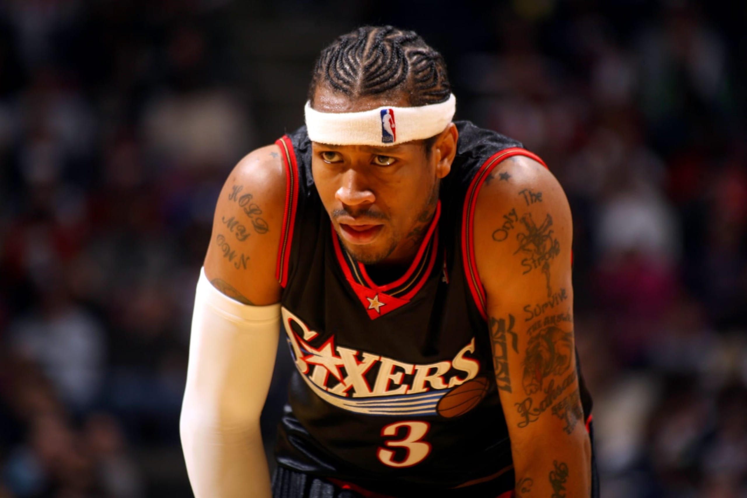 EAST RUTHERFORD, NJ - DECEMBER 2:  Allen Iverson #3 of the Philadelphia 76ers rests during the game against the New Jersey Nets on December 2, 2006 at the Continental Airlines Arena in East Rutherford, New Jersey. The Nets won 112-107. NOTE TO USER: User expressly acknowledges and agrees that, by downloading and or using this Photograph, user is consenting to the terms and conditions of the Getty Images License Agreement. Mandatory Copyright Notice: Copyright 2006 NBAE (Photo by Jesse D. Garrabrant/NBAE via Getty Images)