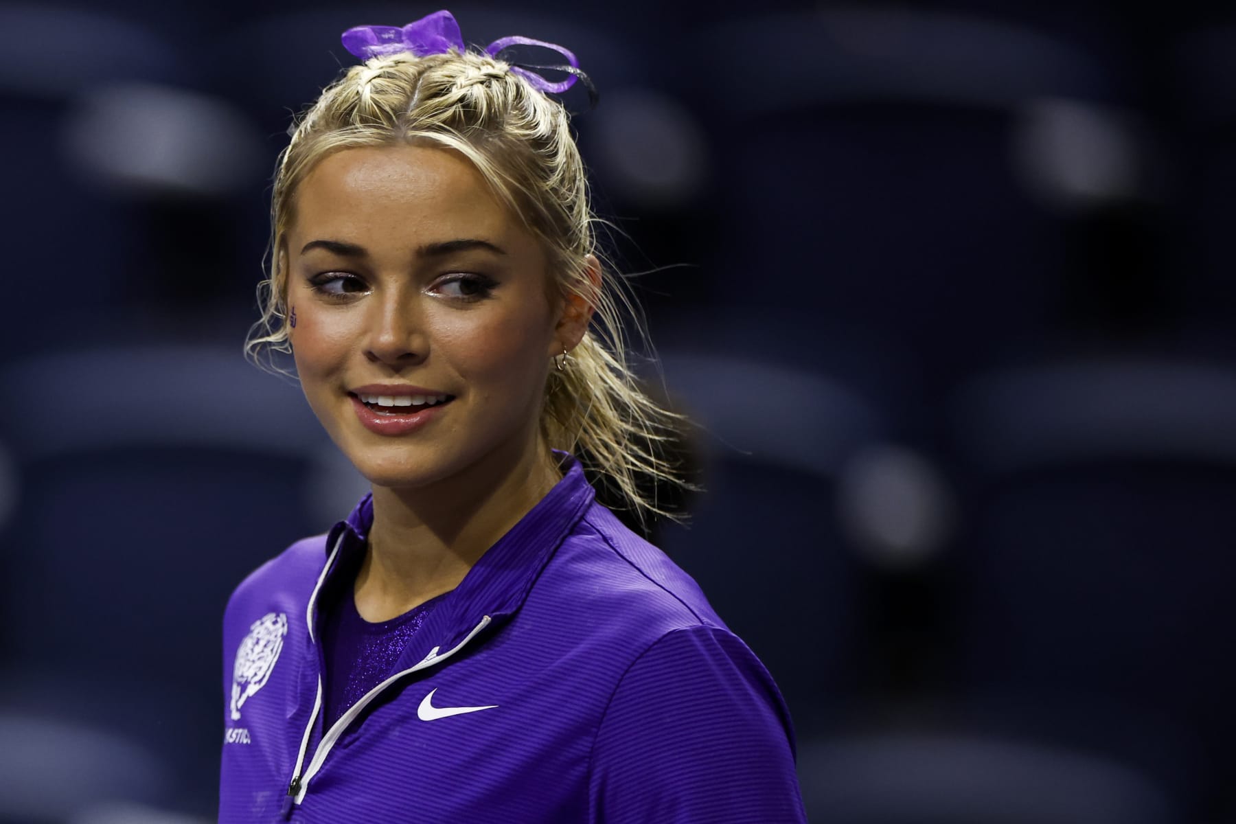 GAINESVILLE, FLORIDA - FEBRUARY 23: Olivia Dunne of the LSU Tigers looks on before a meet against the Florida Gators at the Stephen C. O'Connell Center on February 23, 2024 in Gainesville, Florida. (Photo by James Gilbert/Getty Images)
