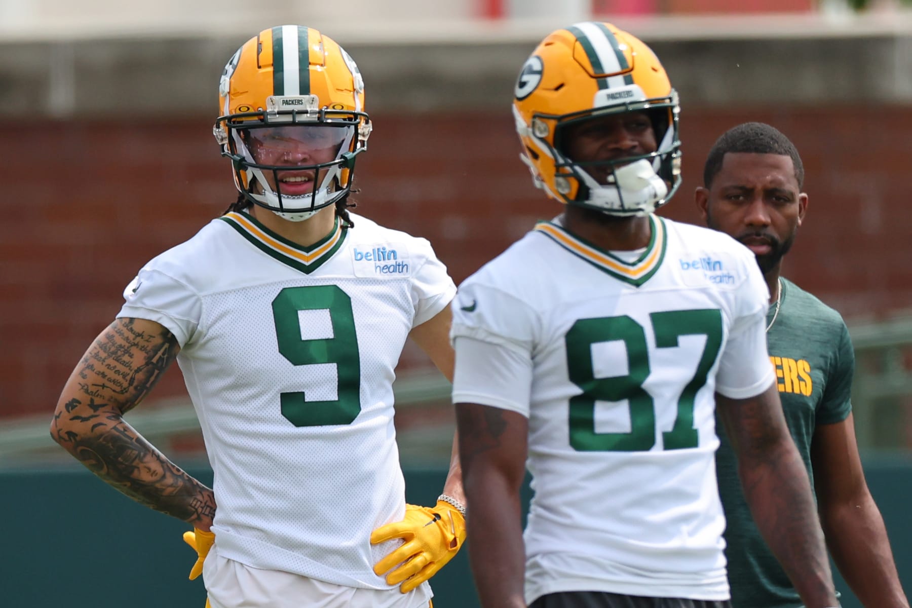 GREEN BAY, WISCONSIN - JUNE 04: Christian Watson #9 and Romeo Doubs #87 of the Green Bay Packers participate in drills during the Green Bay Packers Minicamp at Ray Nitschke Field on June 04, 2024 in Green Bay, Wisconsin.  (Photo by Stacy Revere/Getty Images)