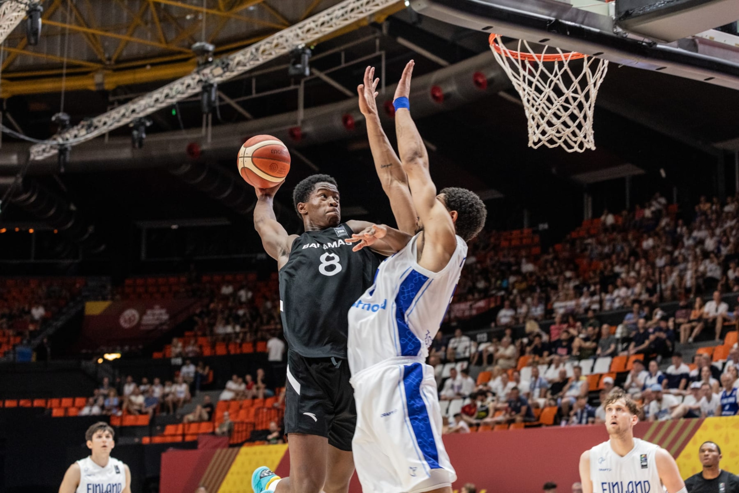 VALENCIA, SPAIN - 2024/07/02: V.J. Edgecombe (L) of Bahamas and Olivier Nkamhoua (R) in action during the Olympic Qualifying Tournament match between Bahamas and Finland at Pabellon Fuente de San Luis. Final score : Bahamas 96-85 Finland. (Photo by Nicholas Muller/SOPA Images/LightRocket via Getty Images) VALENCIA, SPAIN - 2024/07/02: V.J. Edgecombe (L) of Bahamas and Olivier Nkamhoua (R) in action during the Olympic Qualifying Tournament match between Bahamas and Finland at Pabellon Fuente de San Luis. Final score : Bahamas 96-85 Finland. (Photo by Nicholas Muller/SOPA Images/LightRocket via Getty Images)