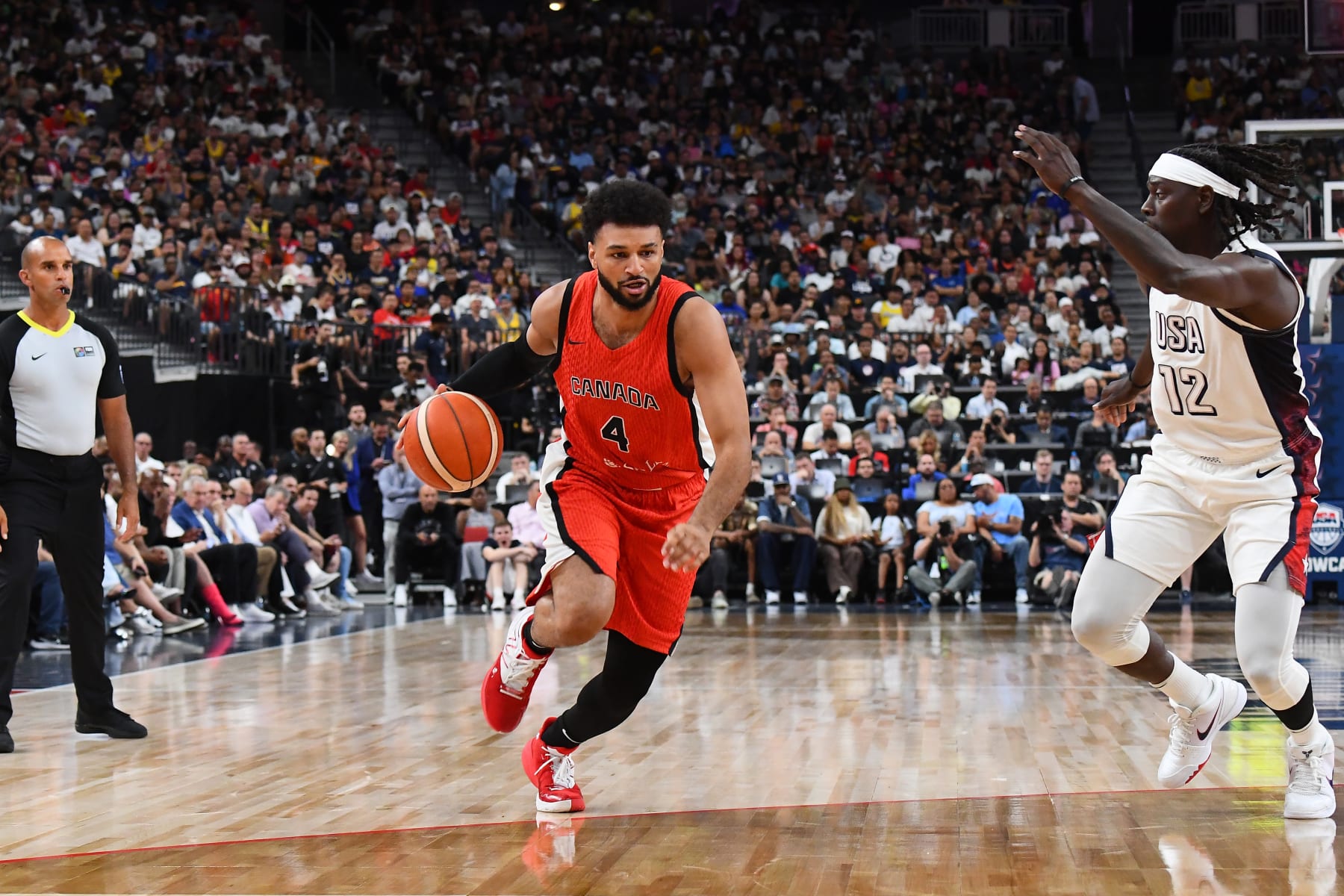 LAS VEGAS, NV - JULY 10: Jamal Murray #4 of the Canada Men's Basketball Team dribbles the ball during the game against the USA Basketball Men's Team on July 10, 2024 at the T-Mobile Arena in Las Vegas, Nevada. NOTE TO USER: User expressly acknowledges and agrees that, by downloading and/or using this Photograph, user is consenting to the terms and conditions of the Getty Images License Agreement. Mandatory Copyright Notice: Copyright 2024 NBAE (Photo by Brian Babineau/NBAE via Getty Images)