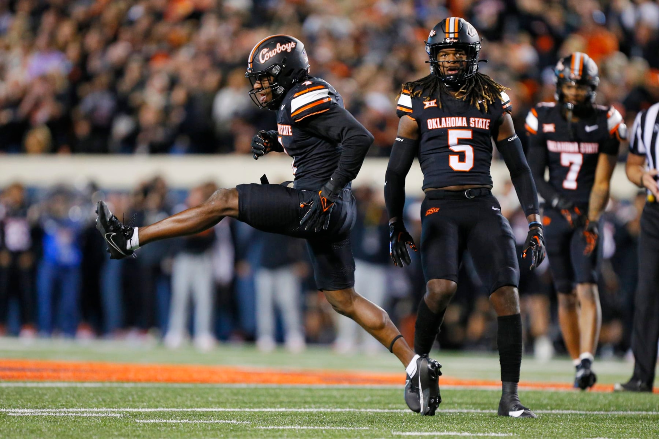 STILLWATER, OK - OCTOBER 6:  Linebacker Nickolas Martin #4 of the Oklahoma State Cowboys celebrates a sack against quarterback Will Howard #18 of the Kansas State Wildcats in the second quarter at Boone Pickens Stadium on October 6, 2023 in Stillwater, Oklahoma.  Oklahoma State won 29-21.  (Photo by Brian Bahr/Getty Images)