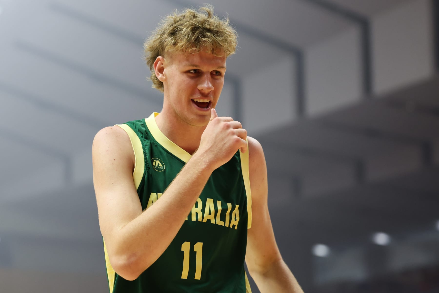 SAPPORO, JAPAN - JUNE 23: Rocco Zikarsky #11 of Australia smiles prior to the Men's International game between Japan and Australia at Hokkaido Prefectural Sports Center on June 23, 2024 in Sapporo, Hokkaido, Japan. (Photo by Takashi Aoyama/Getty Images)